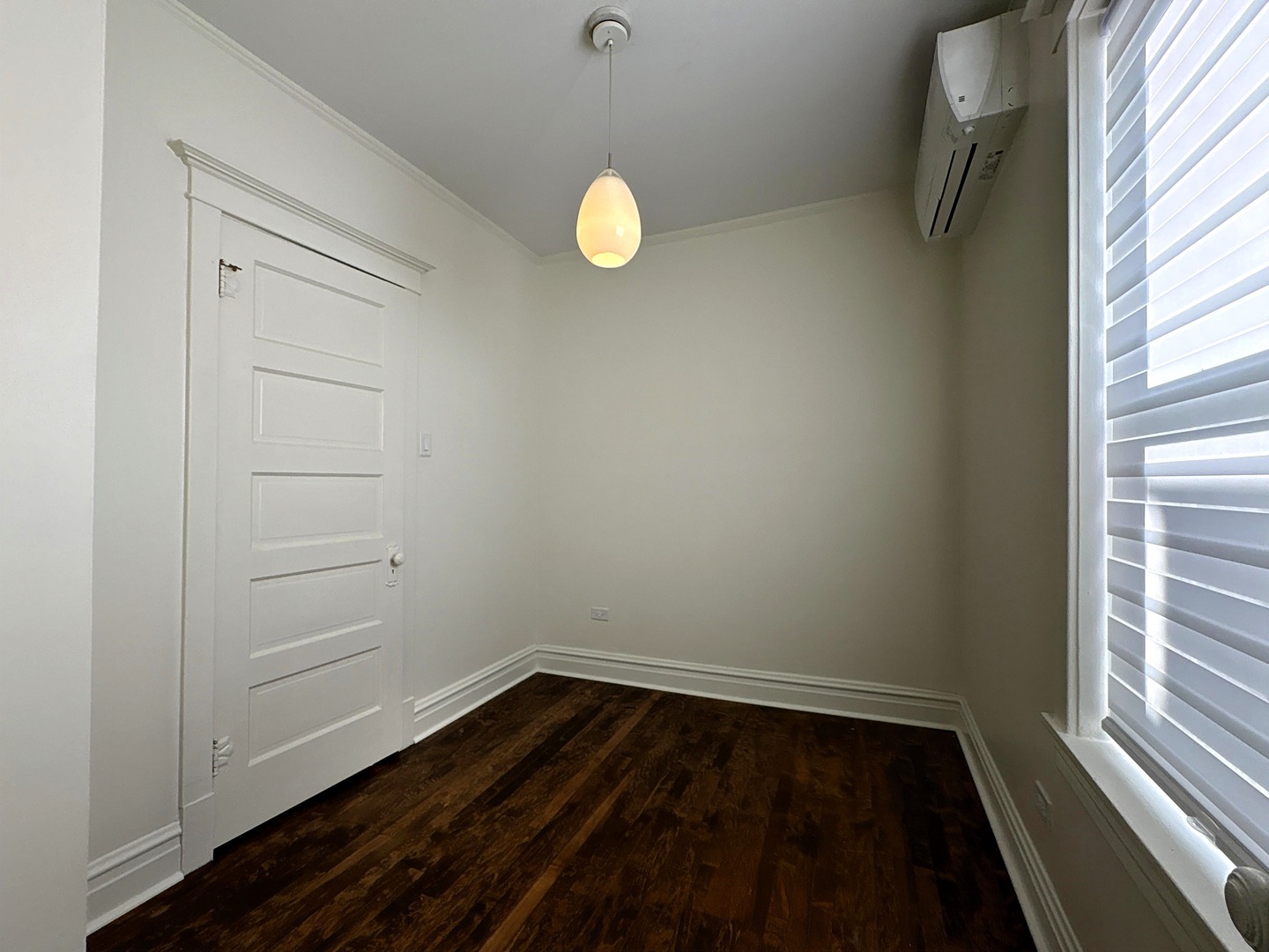 3078 North Davlin Court, Unit 2 Chicago, IL 60618 - Photo 14 of 19 a view of room with window and wooden floor