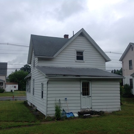 2167 Main Street Three Rivers, MA 01080 - Photo 5 of 6 a view of a house with a yard