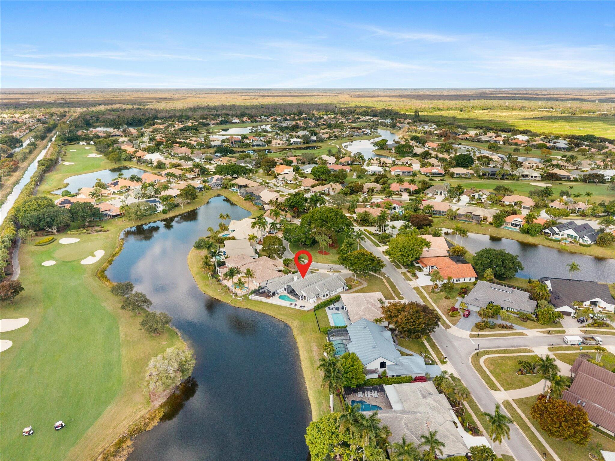 10722 Kirkaldy Lane Boca Raton, FL 33498 - Photo 3 of 76 an aerial view of residential building with outdoor space