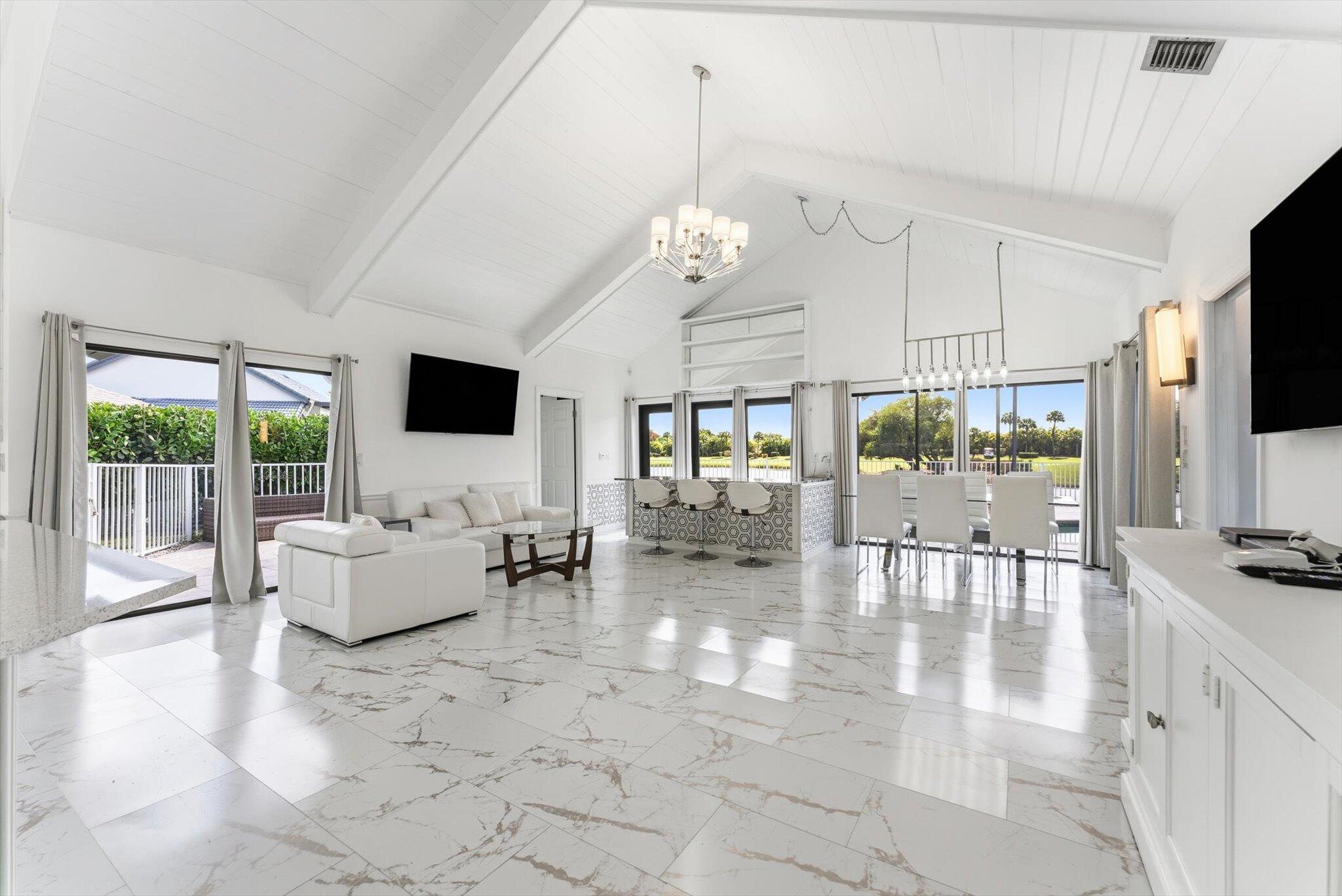 10722 Kirkaldy Lane Boca Raton, FL 33498 - Photo 5 of 76 a living room with fireplace furniture and a flat screen tv