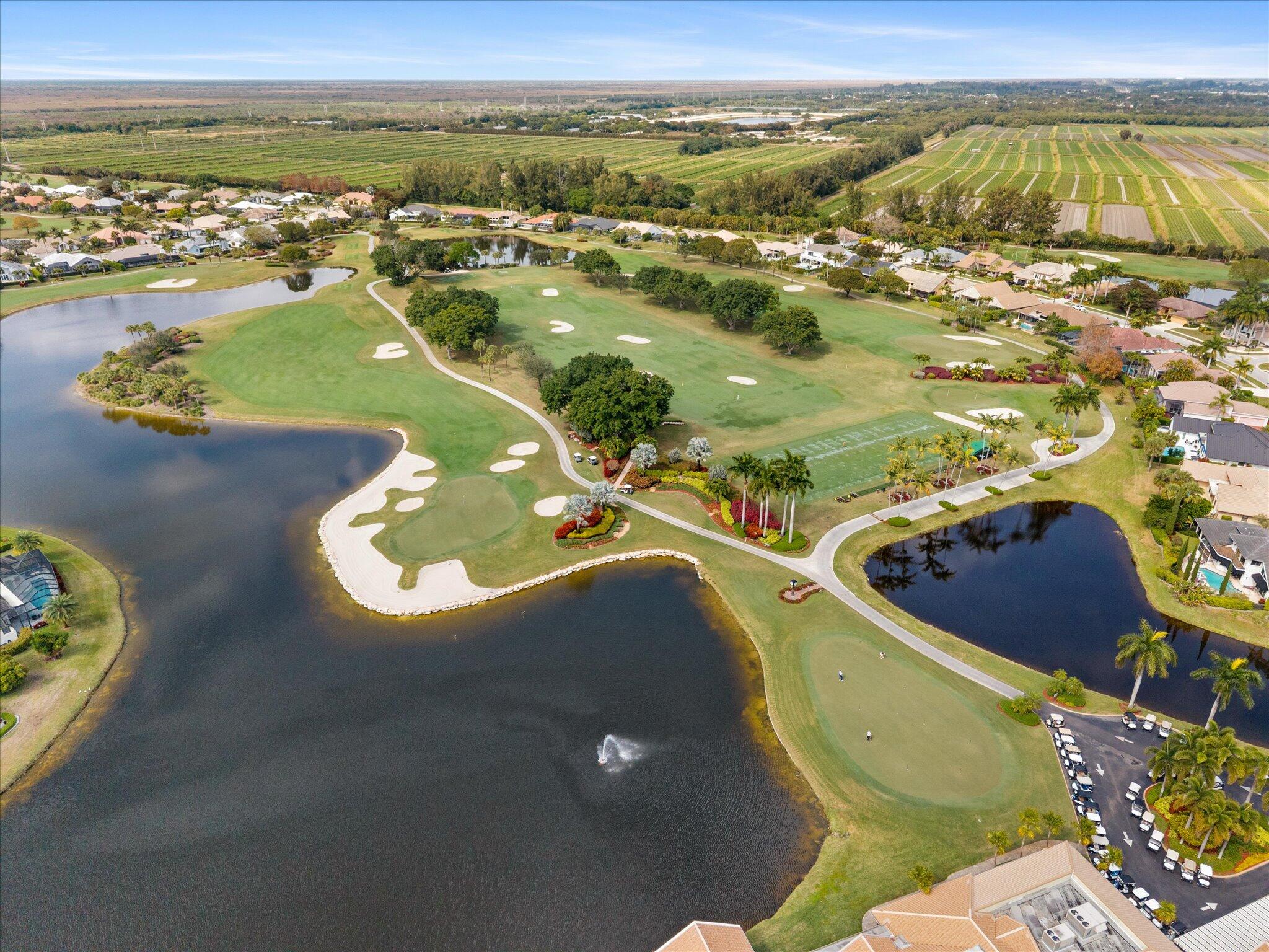 10722 Kirkaldy Lane Boca Raton, FL 33498 - Photo 52 of 76 an aerial view of a house with a lake view