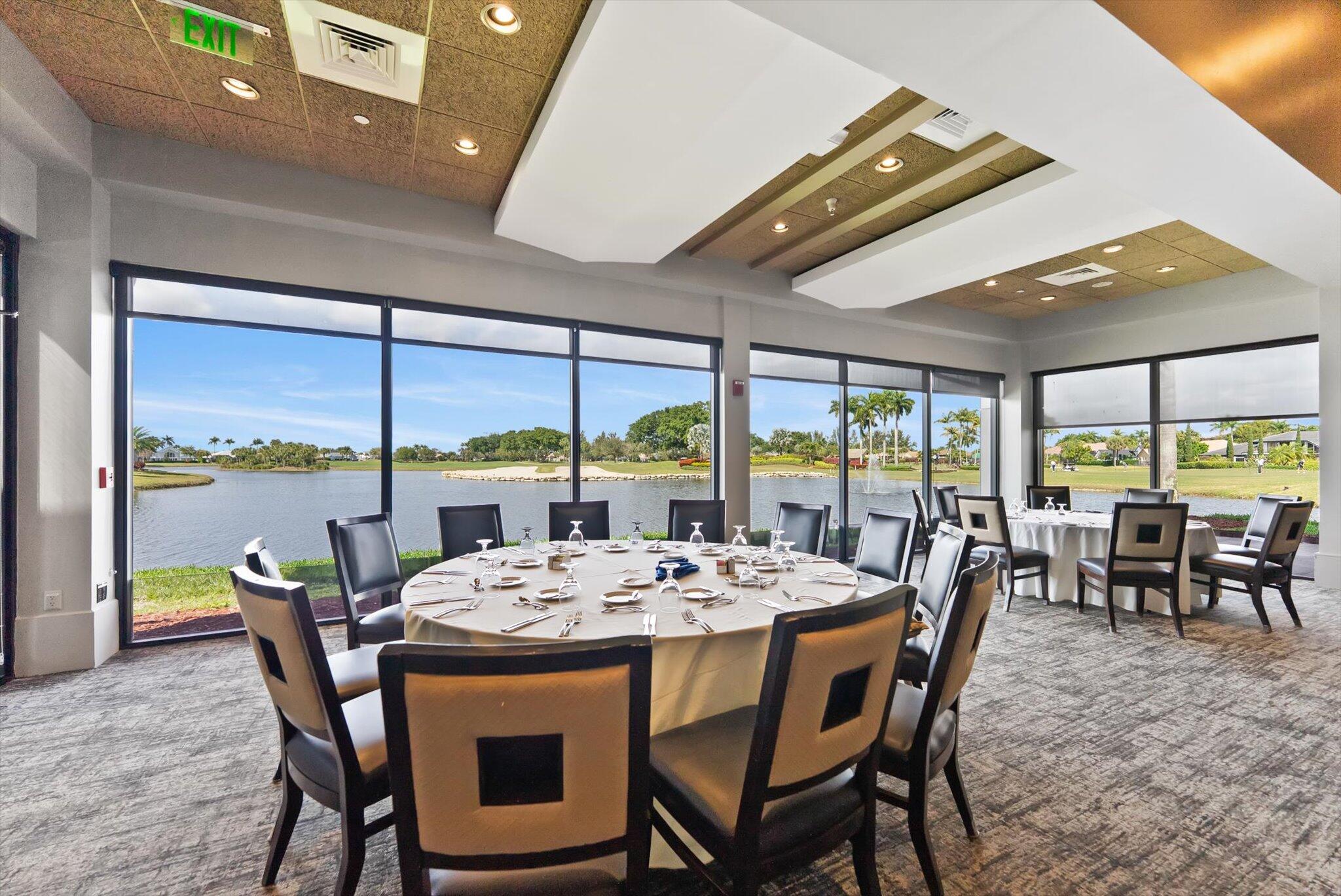 10722 Kirkaldy Lane Boca Raton, FL 33498 - Photo 62 of 76 a view of a dining room with furniture window and outside view