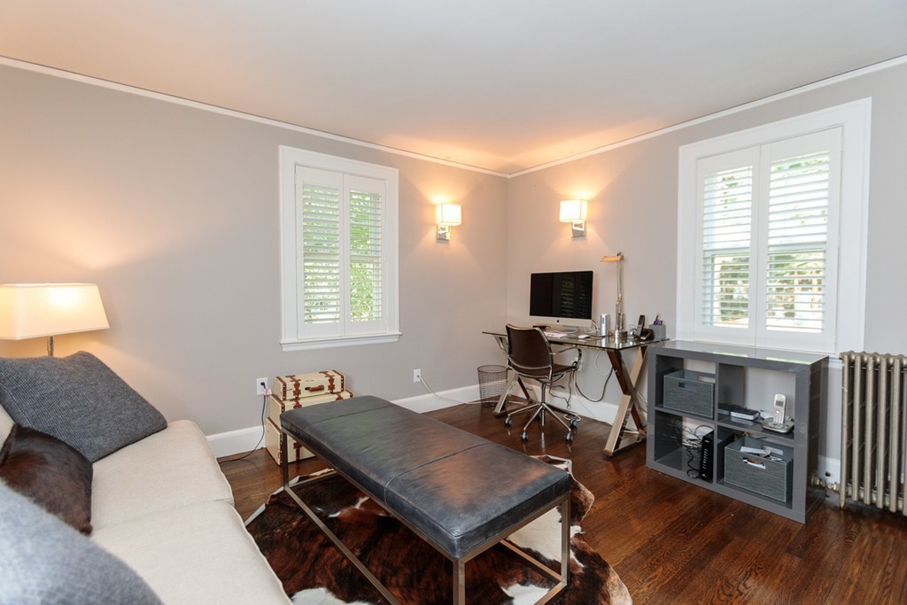 69 Fox Hill Road Wellesley, MA 02481 - Photo 12 of 30 a living room with furniture a flat screen tv and a large window