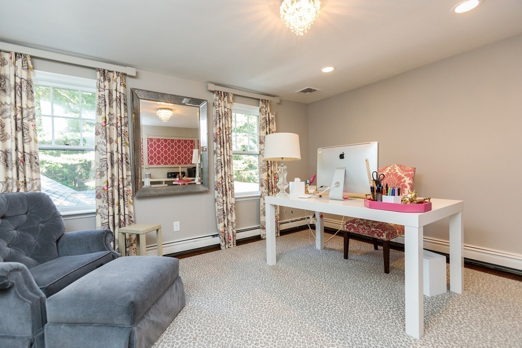 69 Fox Hill Road Wellesley, MA 02481 - Photo 19 of 30 a living room with furniture a flat screen tv and a large window