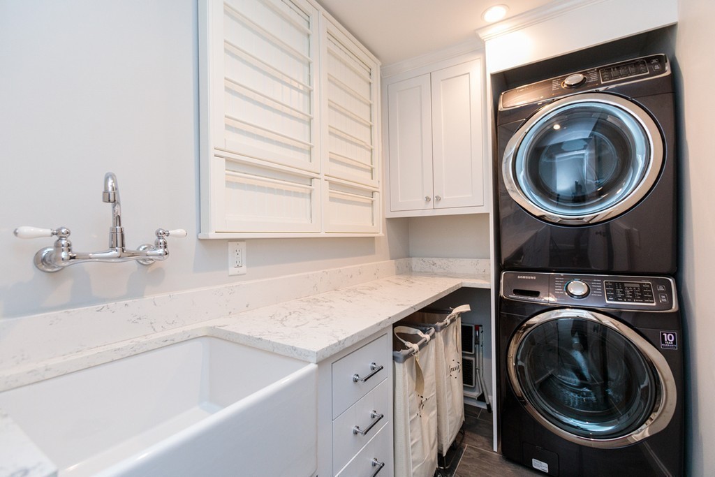 69 Fox Hill Road Wellesley, MA 02481 - Photo 20 of 30 a utility room with sink dryer and washer