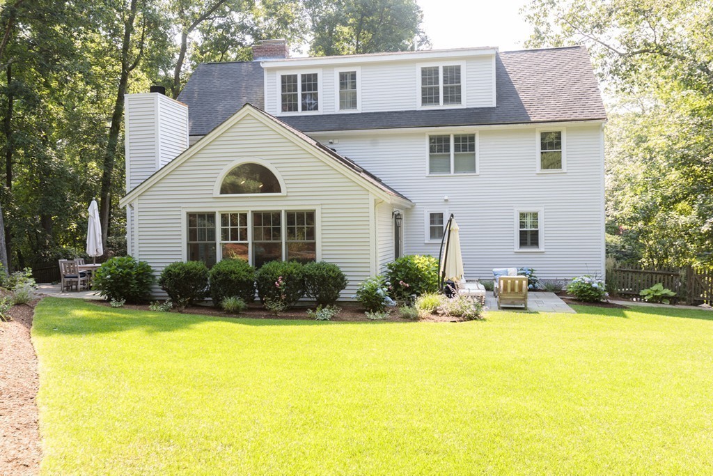 69 Fox Hill Road Wellesley, MA 02481 - Photo 29 of 30 a front view of a house with a yard