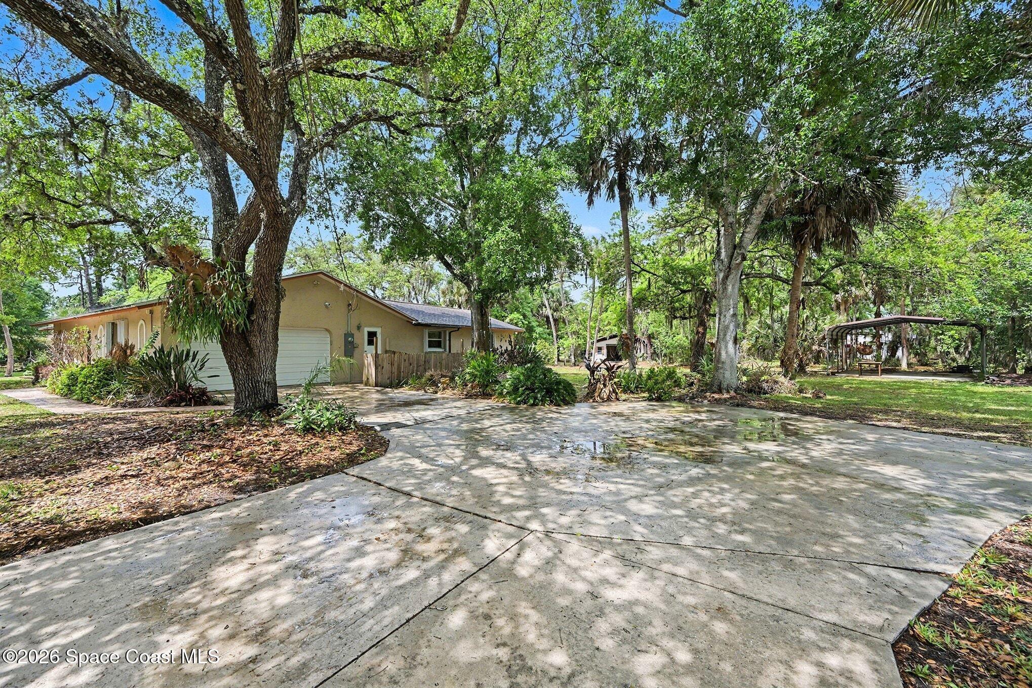 5070 Ranchwood Drive Cocoa, FL 32926 - Photo 3 of 37 018_file_8874