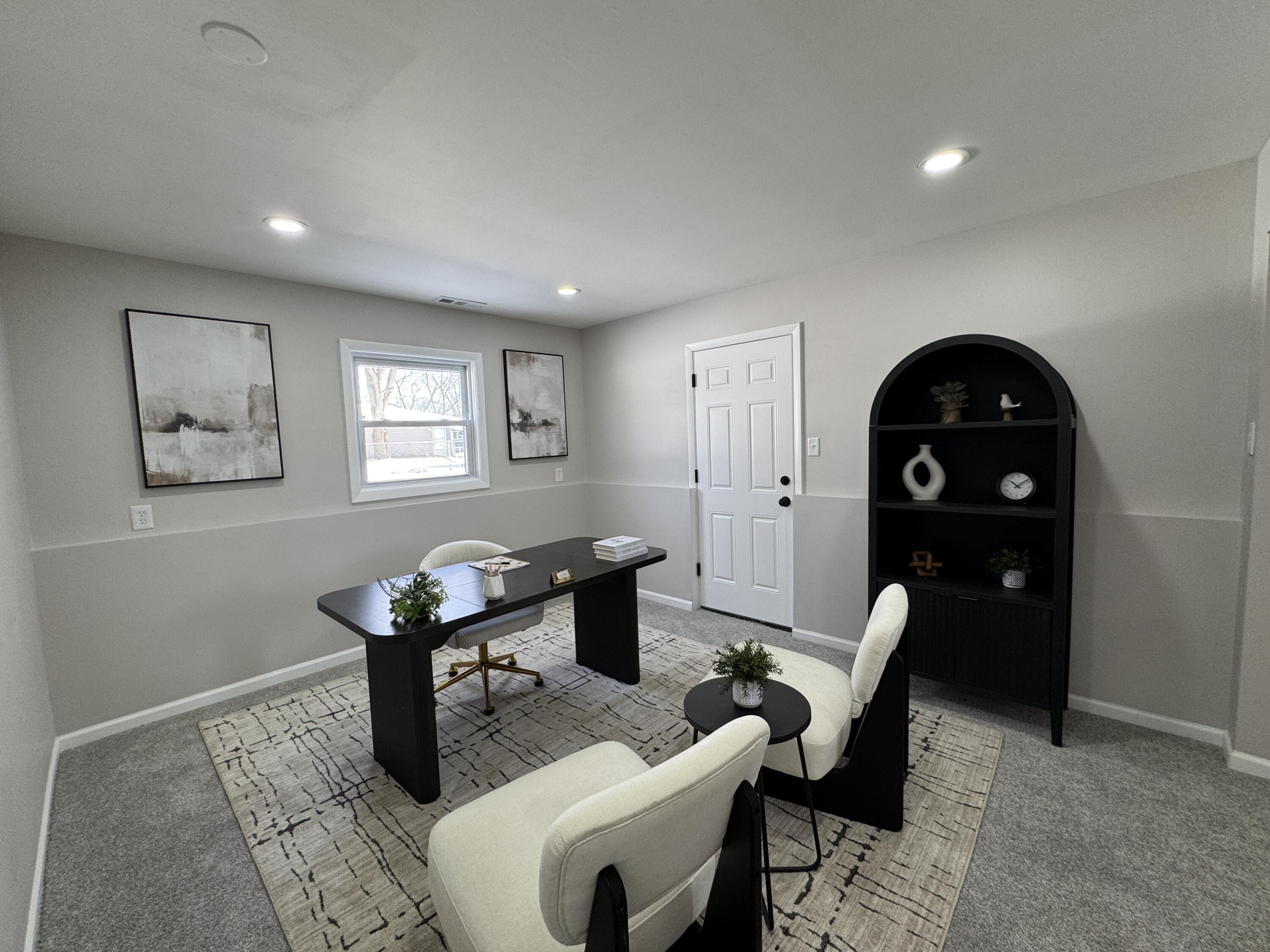 9383 Roosevelt Street Crown Point, IN 46307 - Photo 14 of 20 a living room with furniture a table and wooden floor
