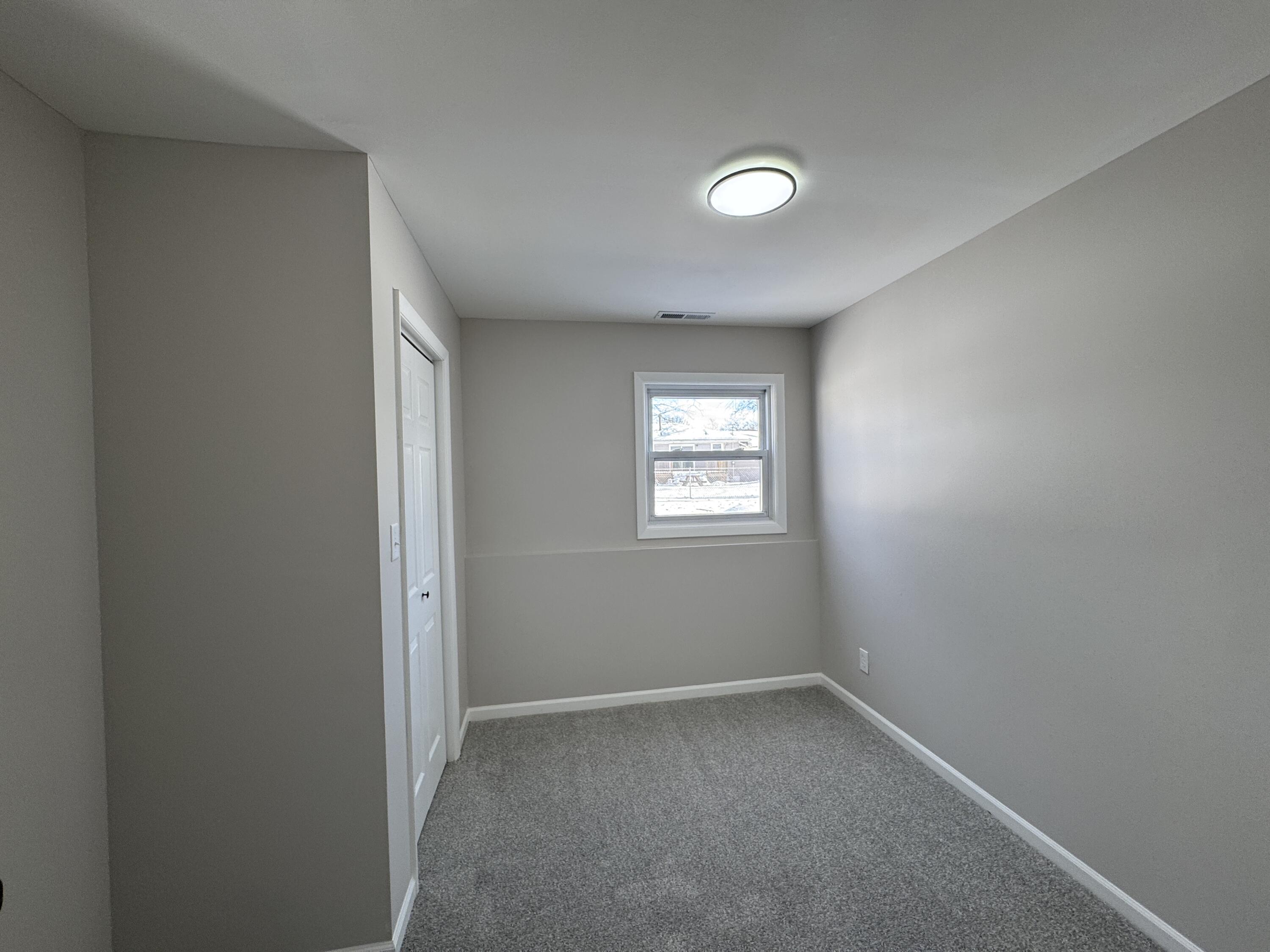 9383 Roosevelt Street Crown Point, IN 46307 - Photo 16 of 20 an empty room with a window