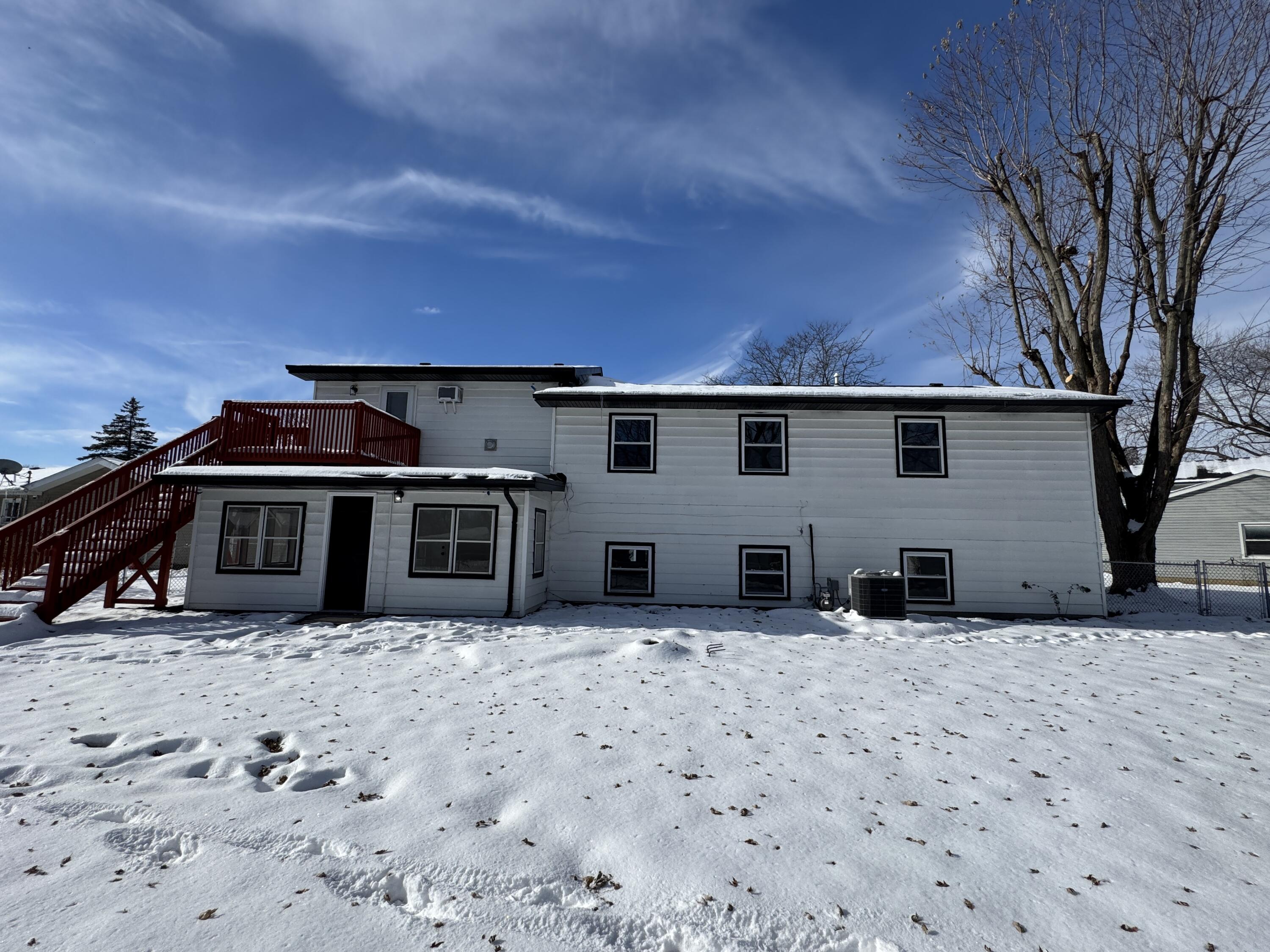 9383 Roosevelt Street Crown Point, IN 46307 - Photo 20 of 20 a view of a house with a snow in the yard