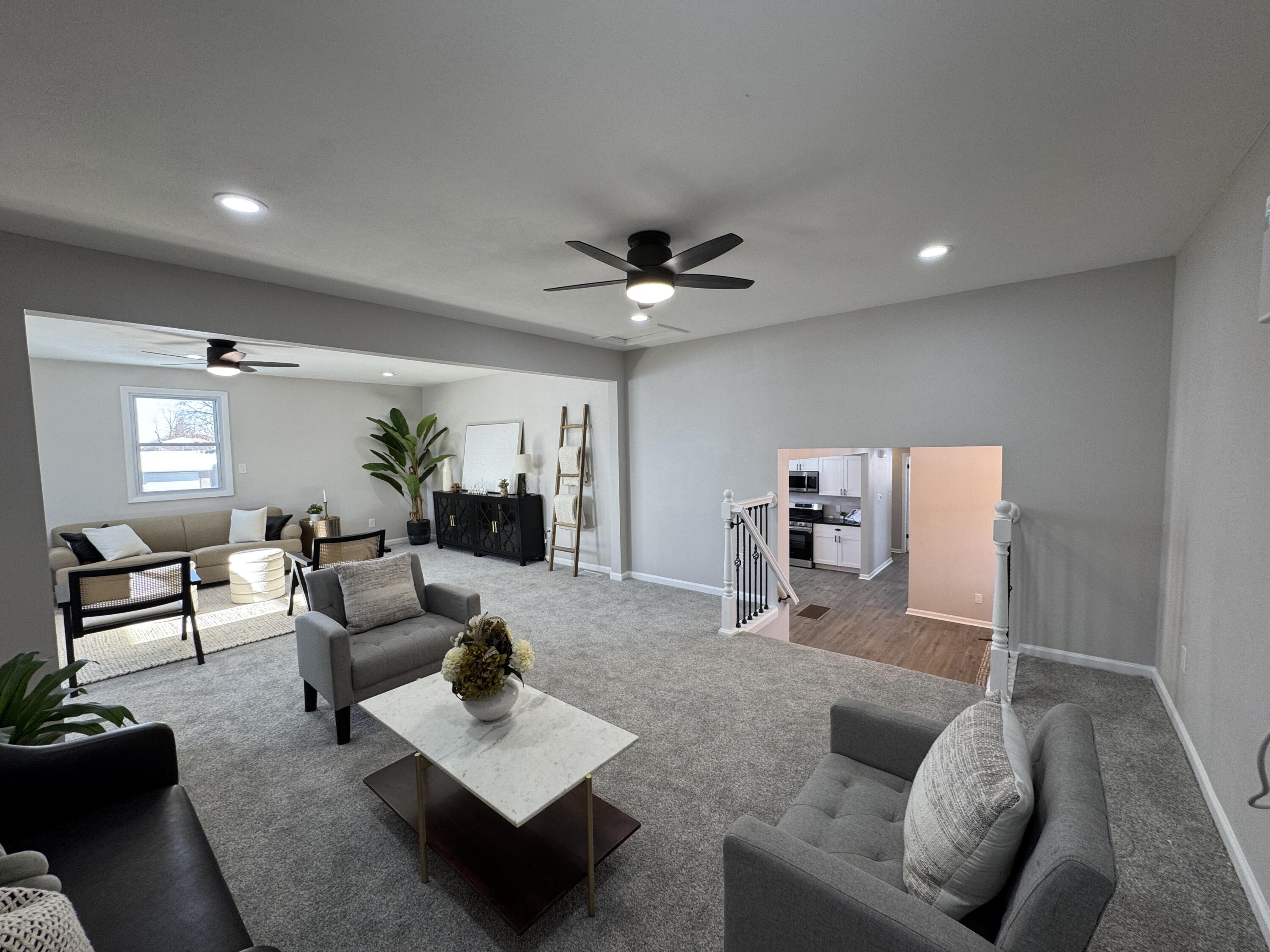9383 Roosevelt Street Crown Point, IN 46307 - Photo 5 of 20 a living room with furniture and wooden floor