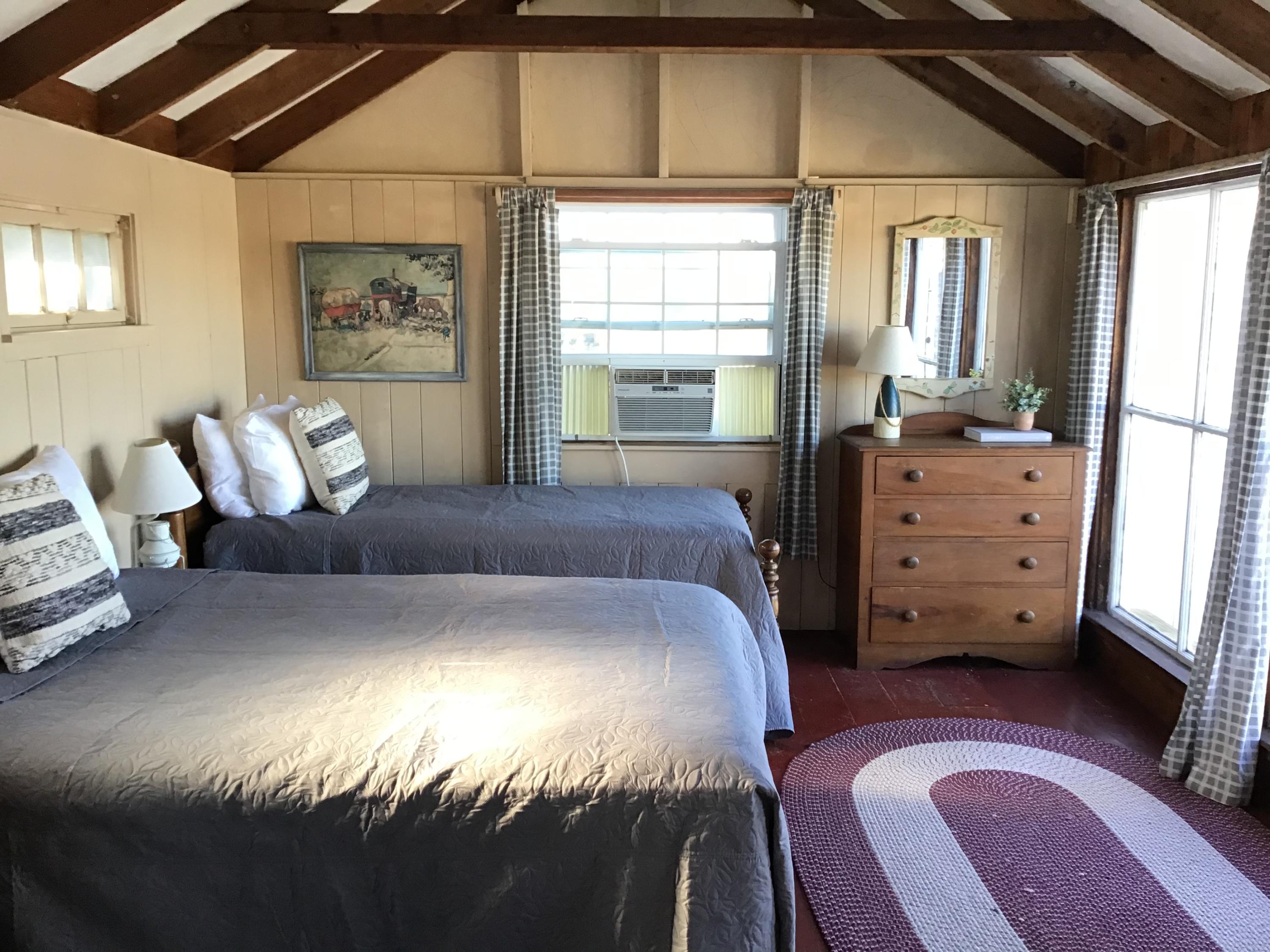 10 Lower County Road Dennis Port, MA 02639 - Photo 15 of 25 a bed room with a bed and a television