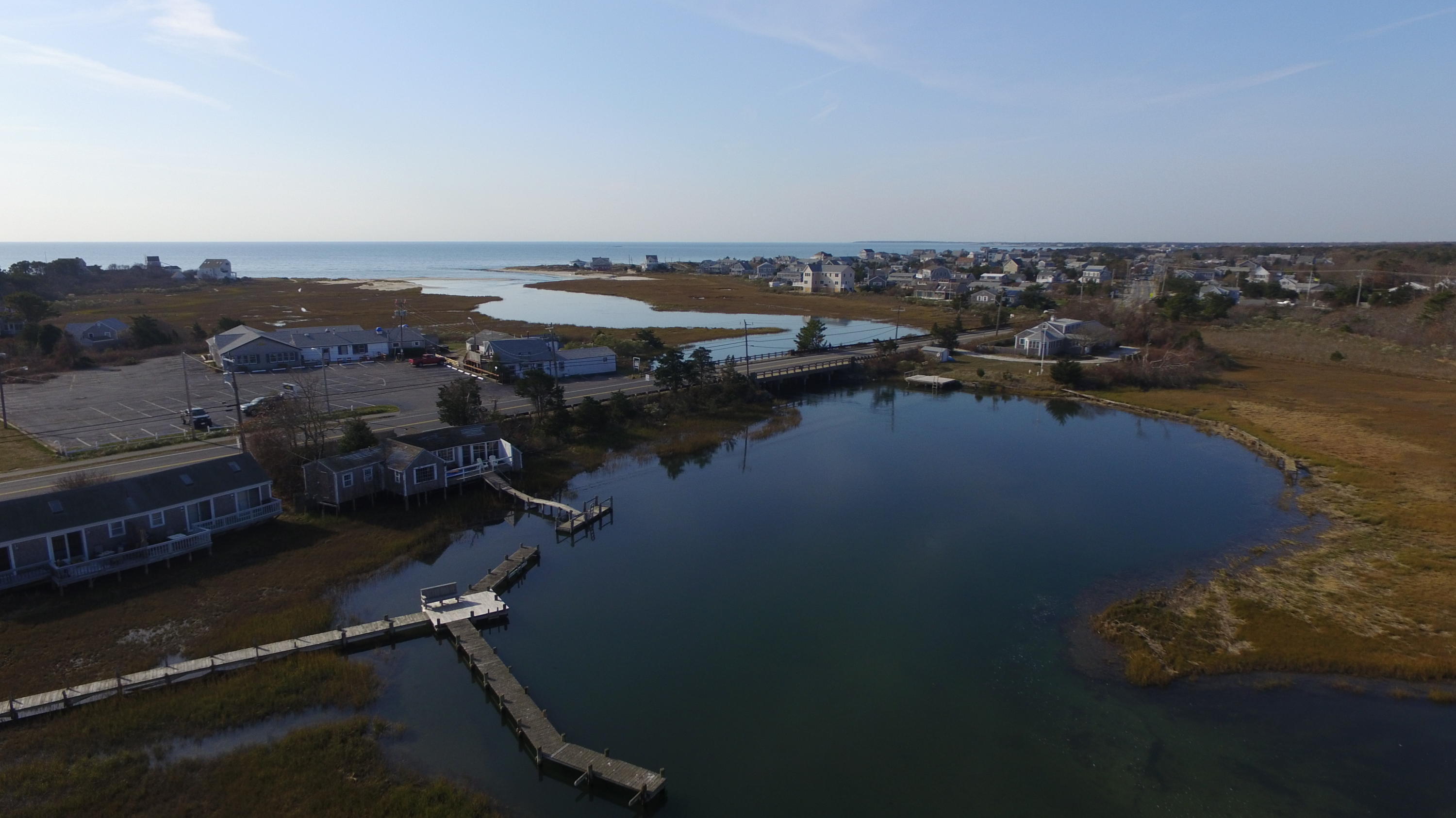 10 Lower County Road Dennis Port, MA 02639 - Photo 2 of 25 an aerial view of lake and city