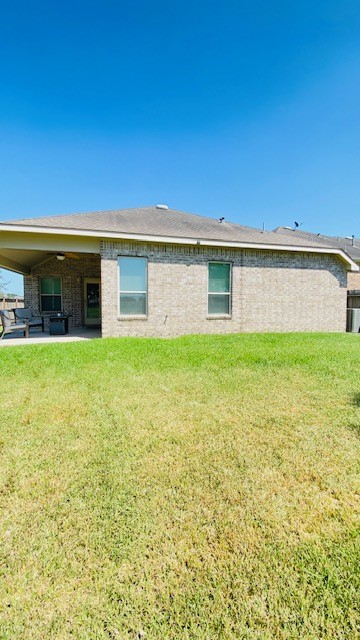 5002 Naples Grove Lane Rosharon, TX 77583 - Photo 31 of 38 Spacious backyard with a covered patio, perfect for outdoor relaxation and entertaining.