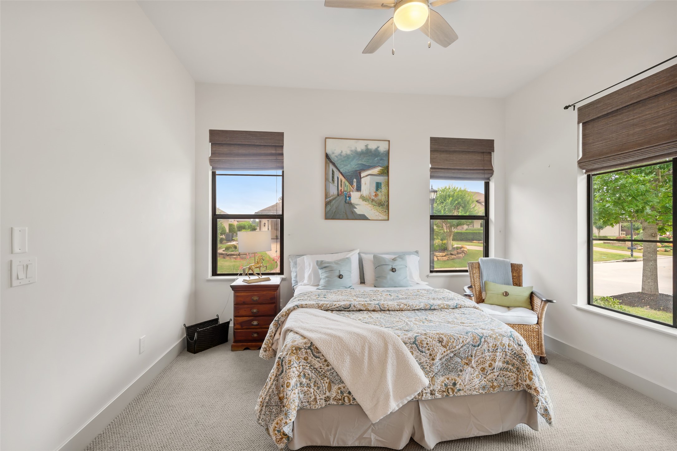 24902 Delaney Knoll Spring, TX 77389 - Photo 22 of 49 a bedroom with a bed and a chandelier