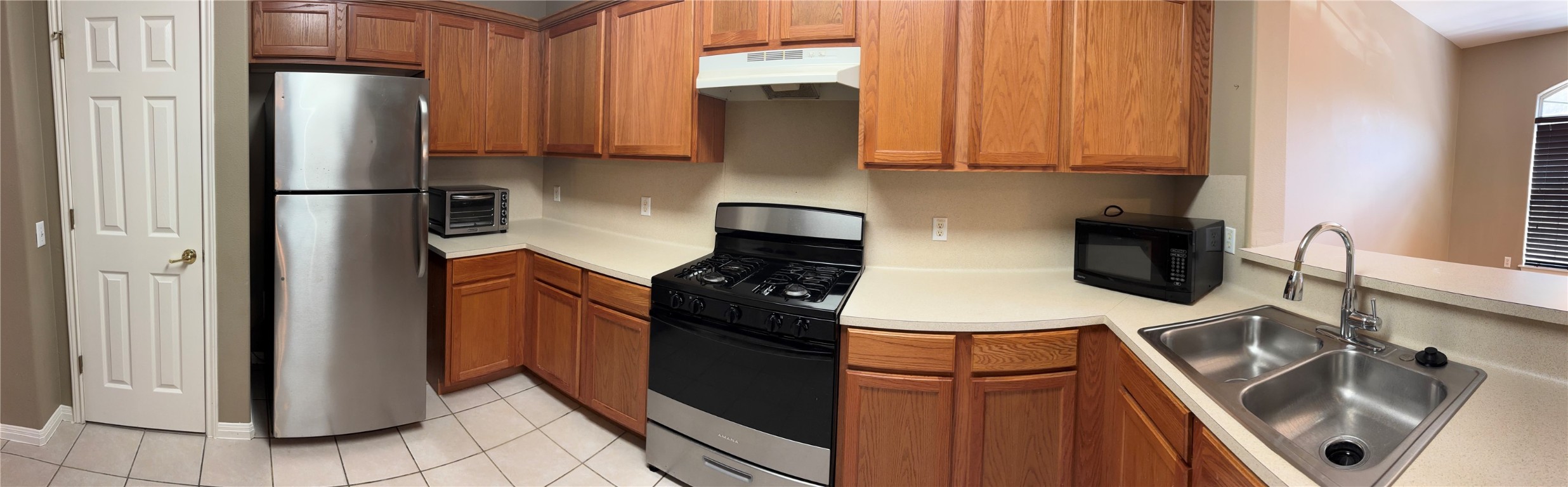 5624 Toscana Avenue Austin, TX 78724 - Photo 16 of 31 Large Kitchen w/Stainless Steel Appliances and ample storage space.