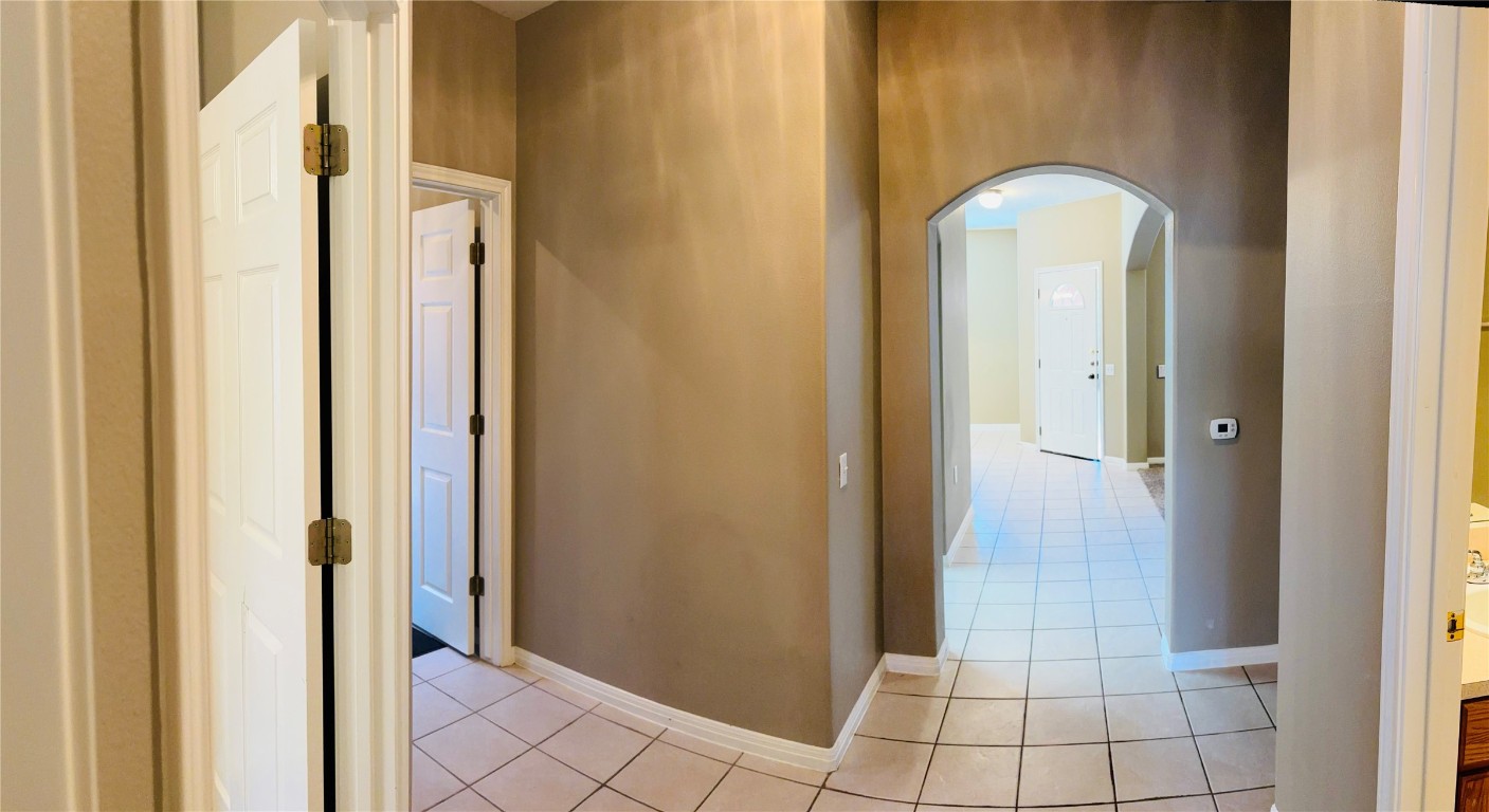 5624 Toscana Avenue Austin, TX 78724 - Photo 18 of 31 Beautiful corridors with arched walkways throughout the home.