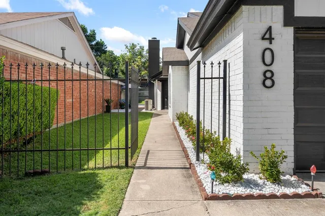 a view of a backyard with a garden