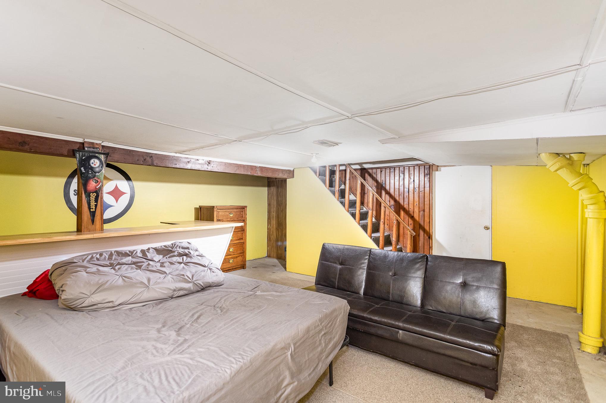 157 North Locust Street Lititz, PA 17543 - Photo 19 of 29 a bedroom with a bed and teddy bear on bed
