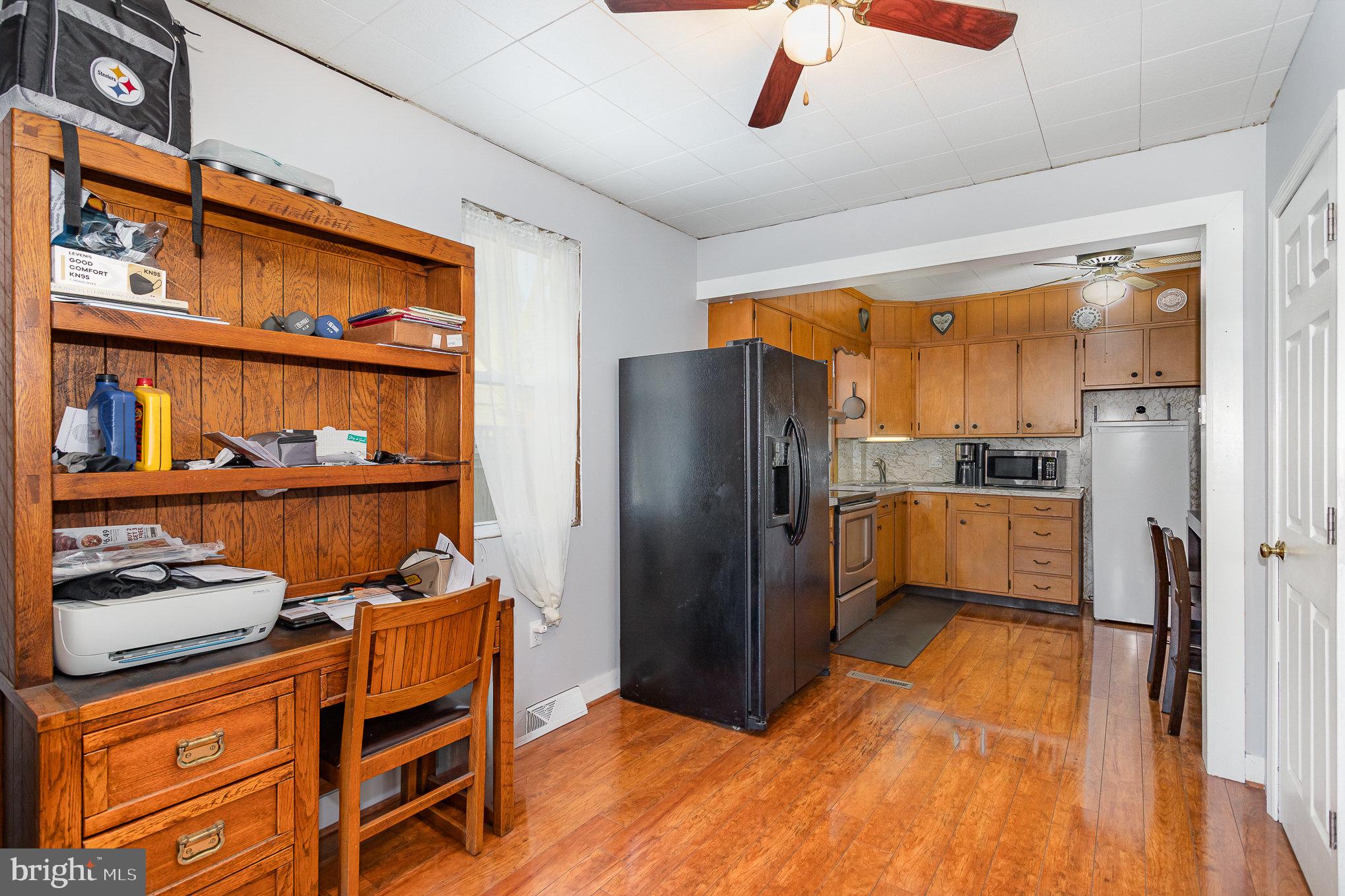 157 North Locust Street Lititz, PA 17543 - Photo 9 of 29 a kitchen with stainless steel appliances granite countertop a refrigerator and a sink