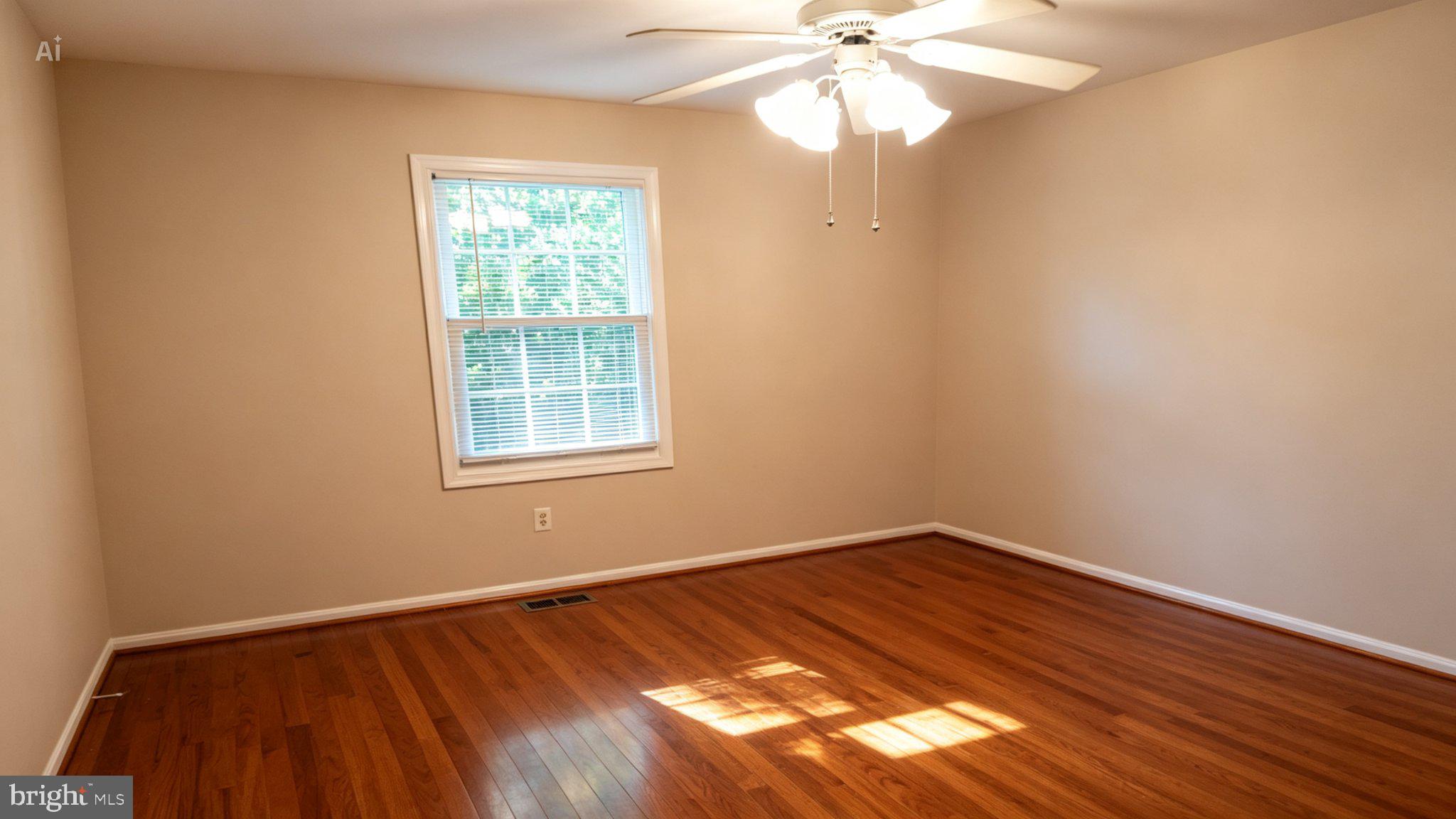 1602 Sundew Court Bowie, MD 20721 - Photo 17 of 31 Bright and airy room with hardwood floors.