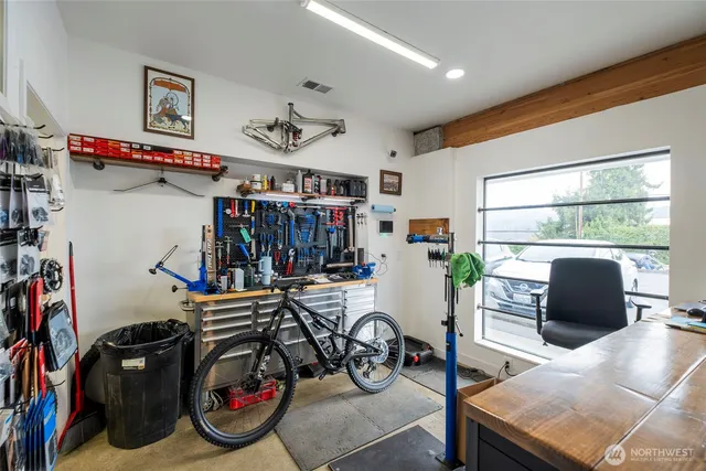 a view of entryway with workspace and stairs