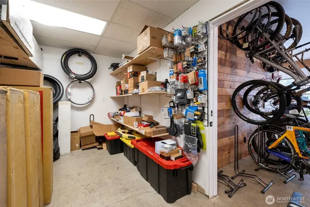 a view of a hallway with bathroom and shower