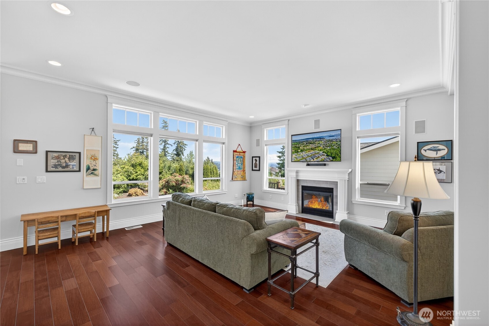 1908 29th Place Anacortes, WA 98221 - Photo 12 of 40 a living room with fireplace furniture and a wooden floor