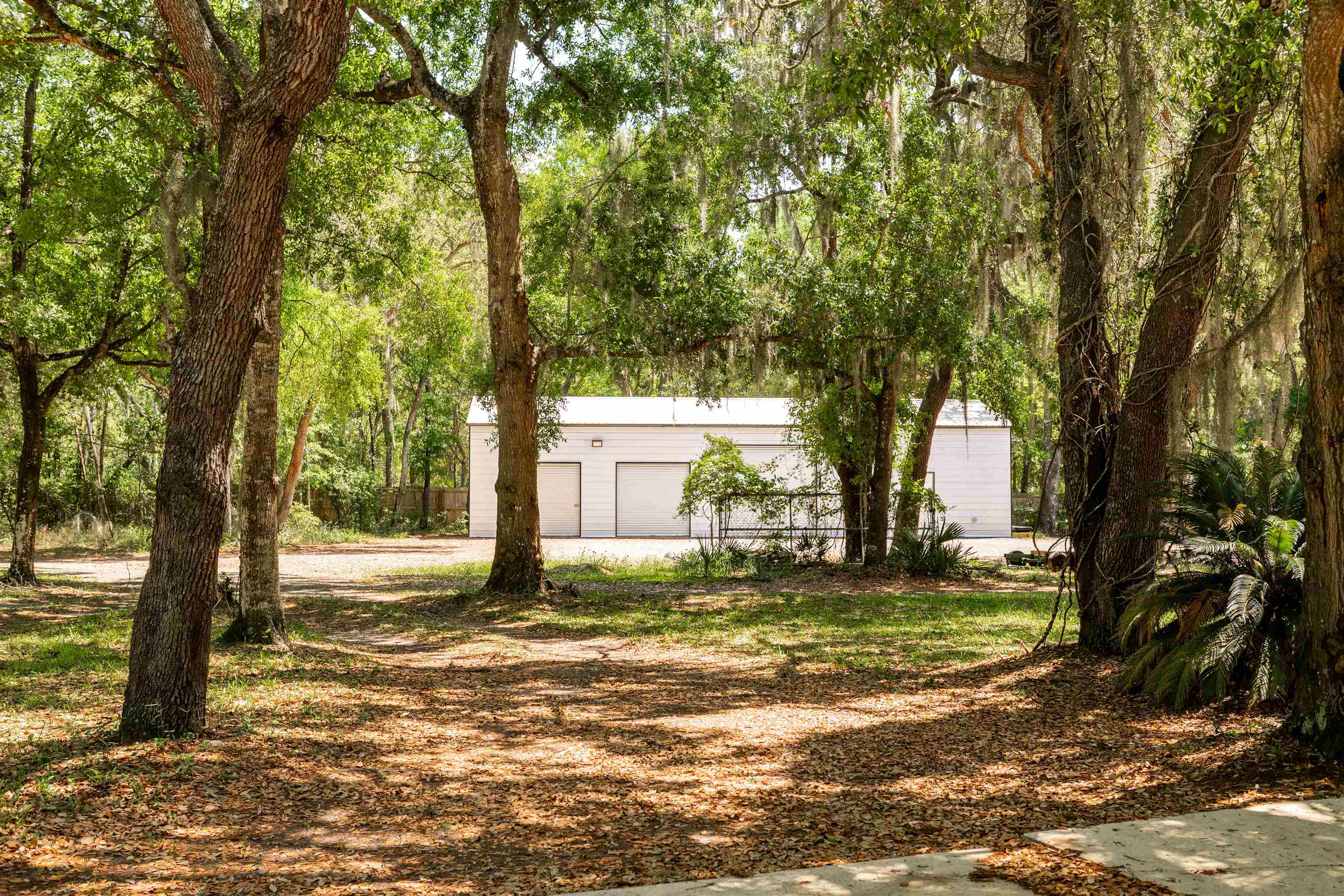 2950 Kings Road St. Augustine, FL 32086 - Photo 17 of 42 a view of a house with a yard