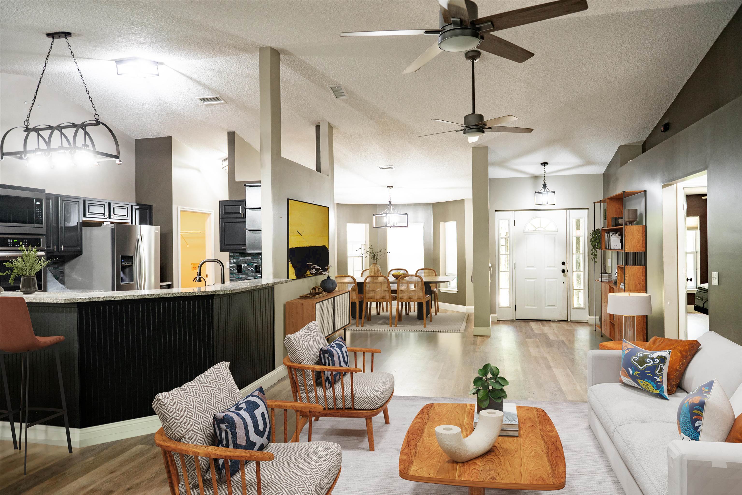 2950 Kings Road St. Augustine, FL 32086 - Photo 19 of 42 a living room with furniture kitchen view and a chandelier