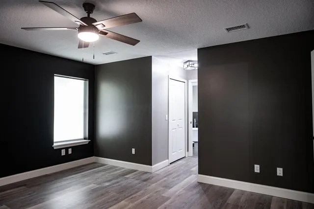a bathroom with a double vanity sink mirror and shower