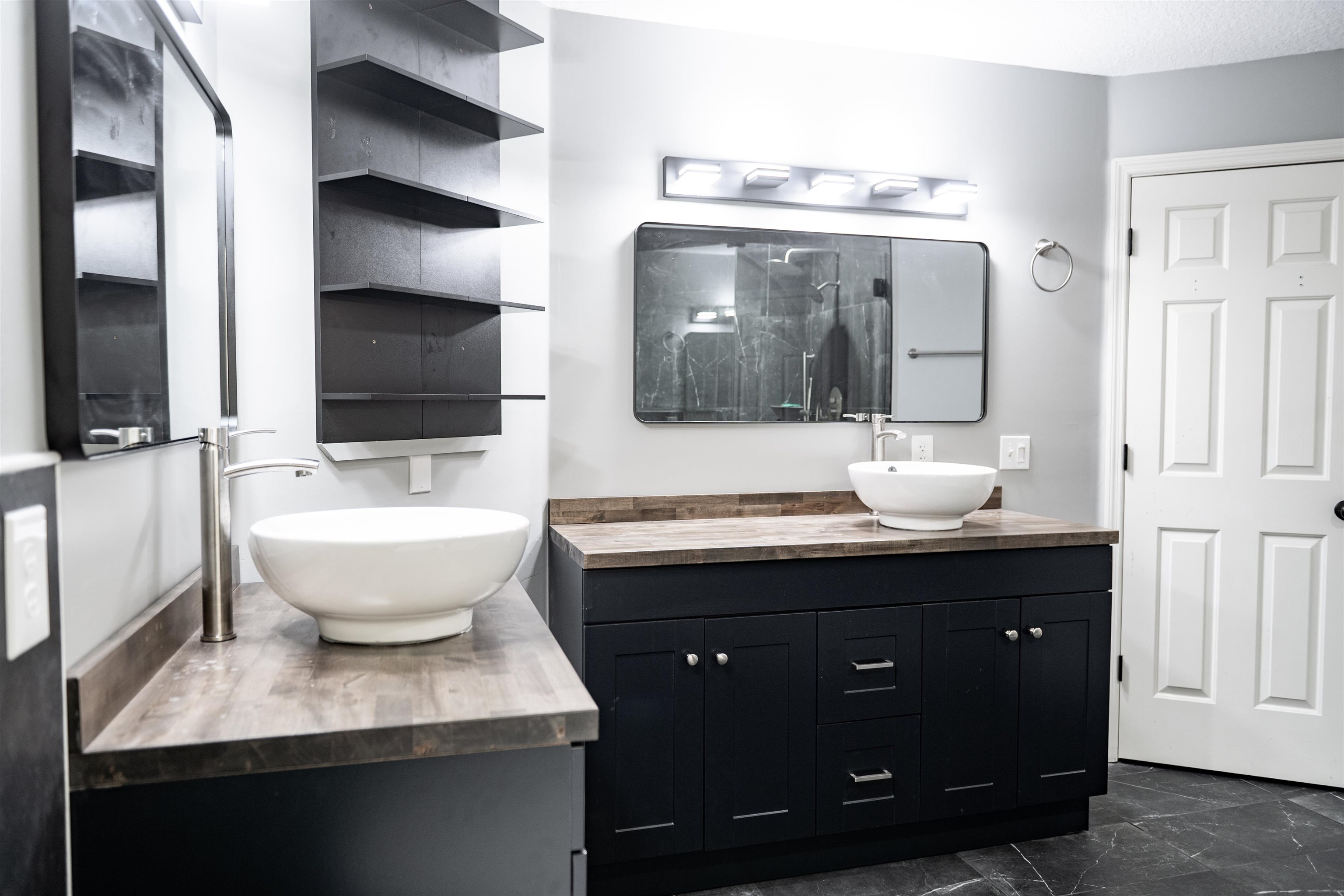 2950 Kings Road St. Augustine, FL 32086 - Photo 28 of 42 a bathroom with a granite countertop sink and a mirror