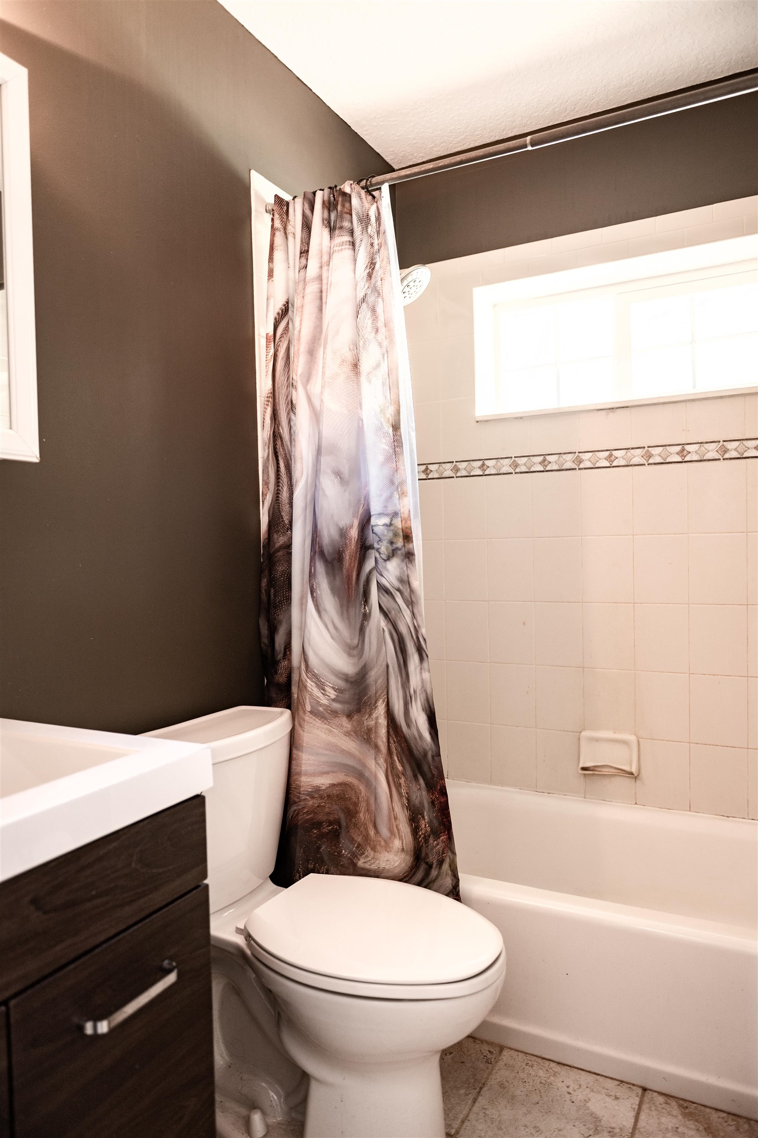 2950 Kings Road St. Augustine, FL 32086 - Photo 35 of 42 a bathroom with a sink a toilet and a bathtub