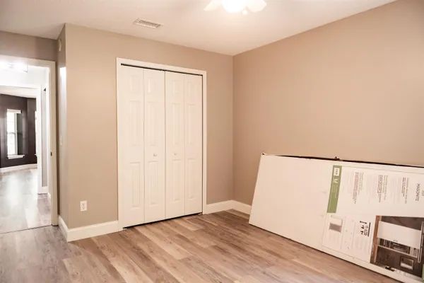 a view of a room with racks on the wall