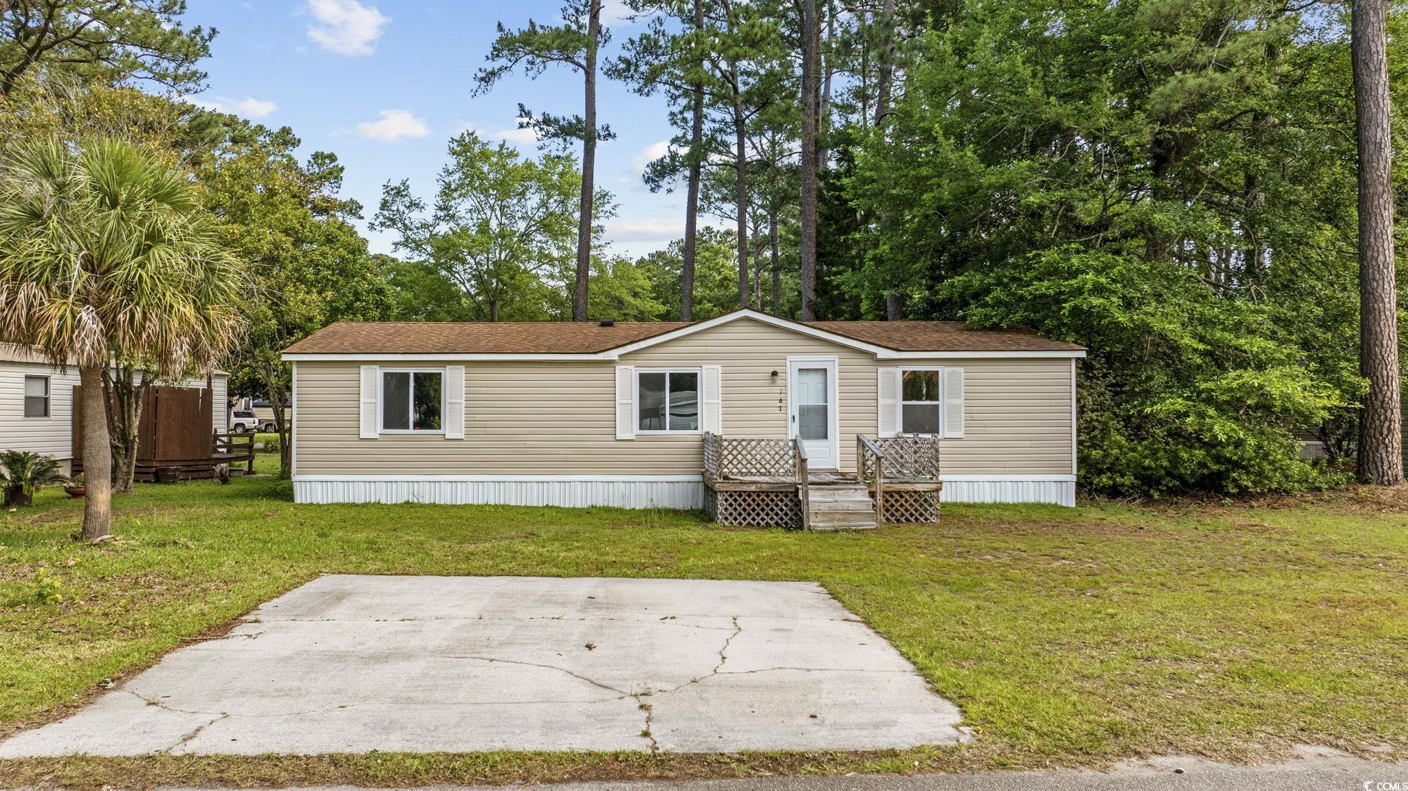 167 Offshore Drive Murrells Inlet, SC 29576 - Photo 1 of 33 Manufactured / mobile home with a front lawn and a