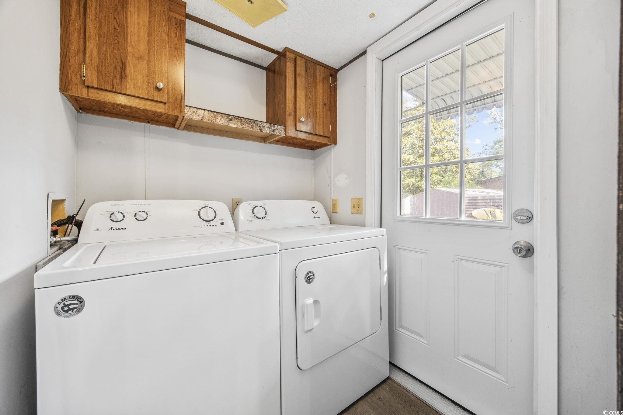 167 Offshore Drive Murrells Inlet, SC 29576 - Photo 14 of 33 Laundry area featuring cabinet space, separate was