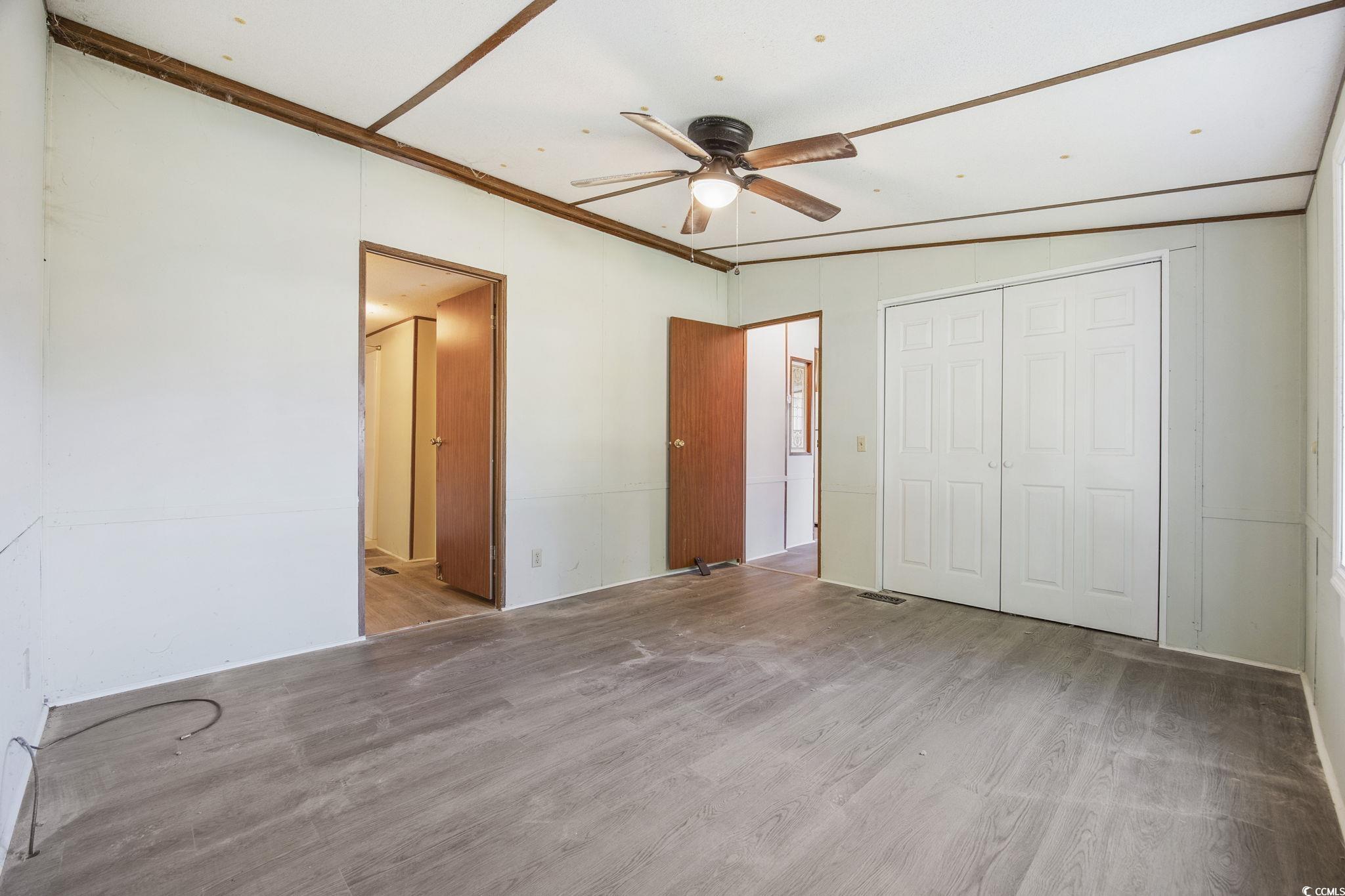 167 Offshore Drive Murrells Inlet, SC 29576 - Photo 23 of 33 Unfurnished bedroom with wood finished floors, a c