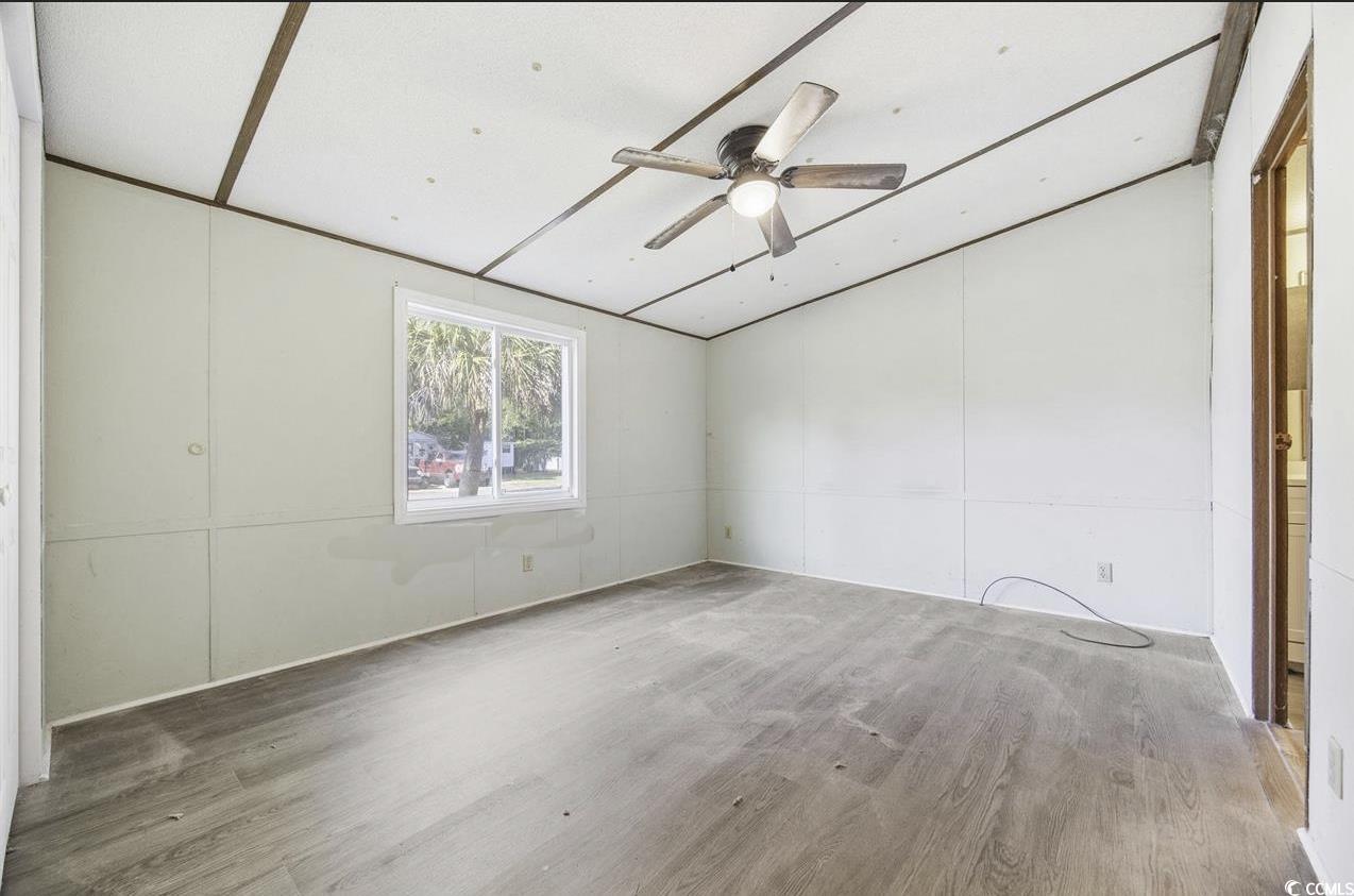 167 Offshore Drive Murrells Inlet, SC 29576 - Photo 8 of 33 Unfurnished bedroom with wood finished floors, lof