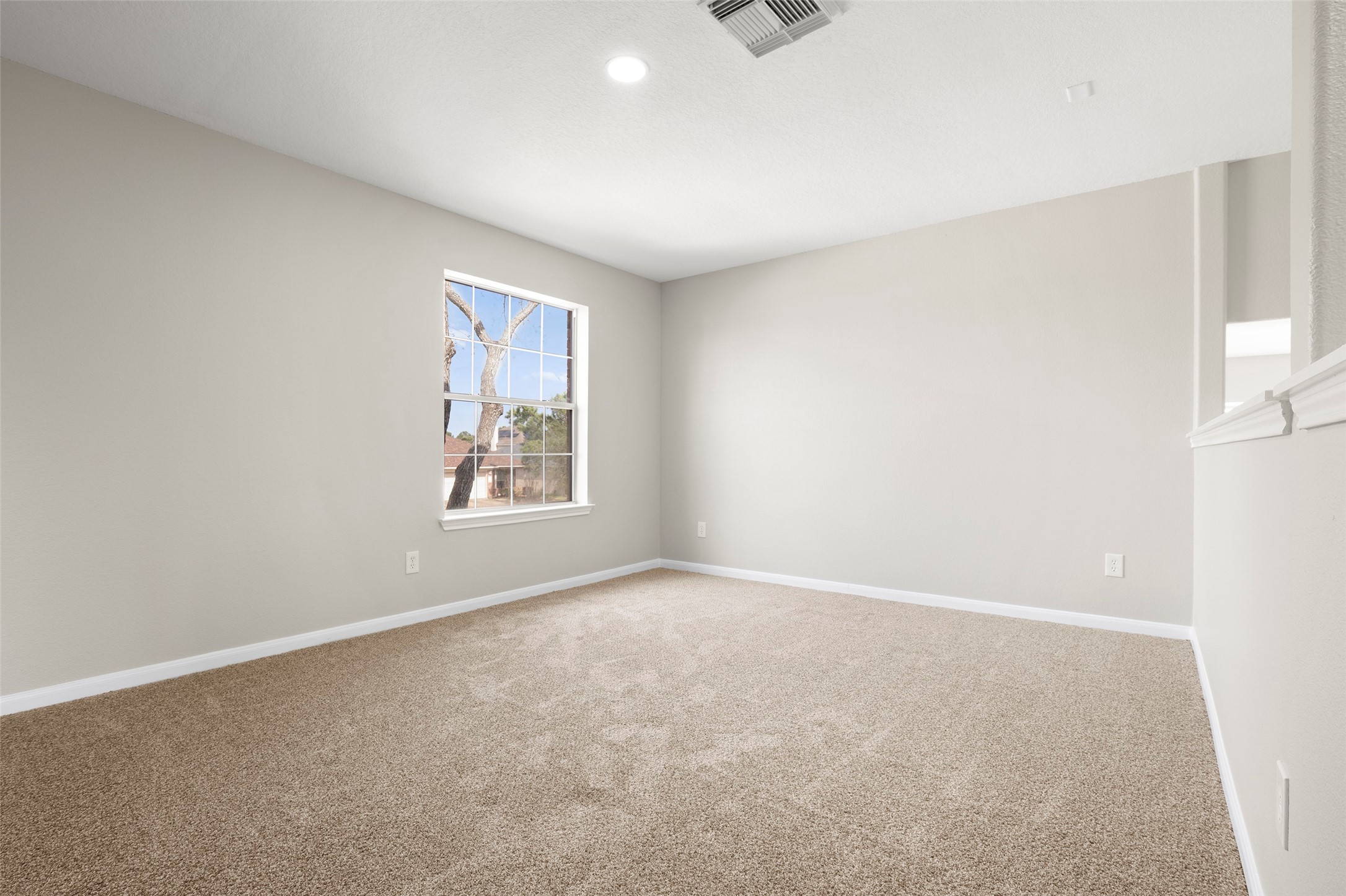 2406 Pinpoint Drive Spring, TX 77373 - Photo 17 of 25 an empty room with windows