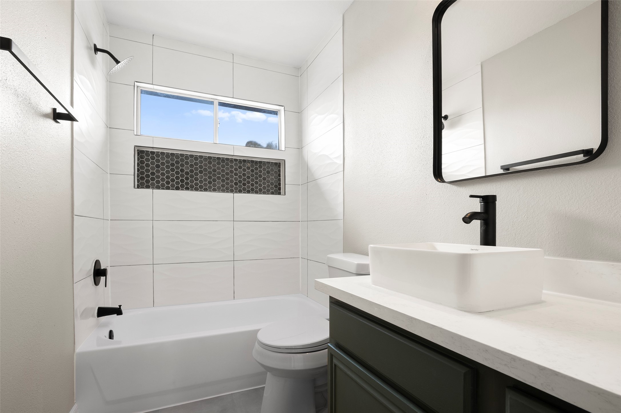 2406 Pinpoint Drive Spring, TX 77373 - Photo 19 of 25 a bathroom with a sink a toilet and shower