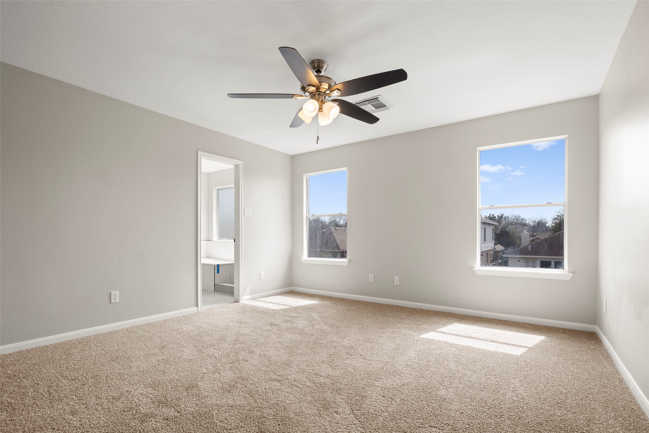 2406 Pinpoint Drive Spring, TX 77373 - Photo 21 of 25 a view of a livingroom with a ceiling fan and window