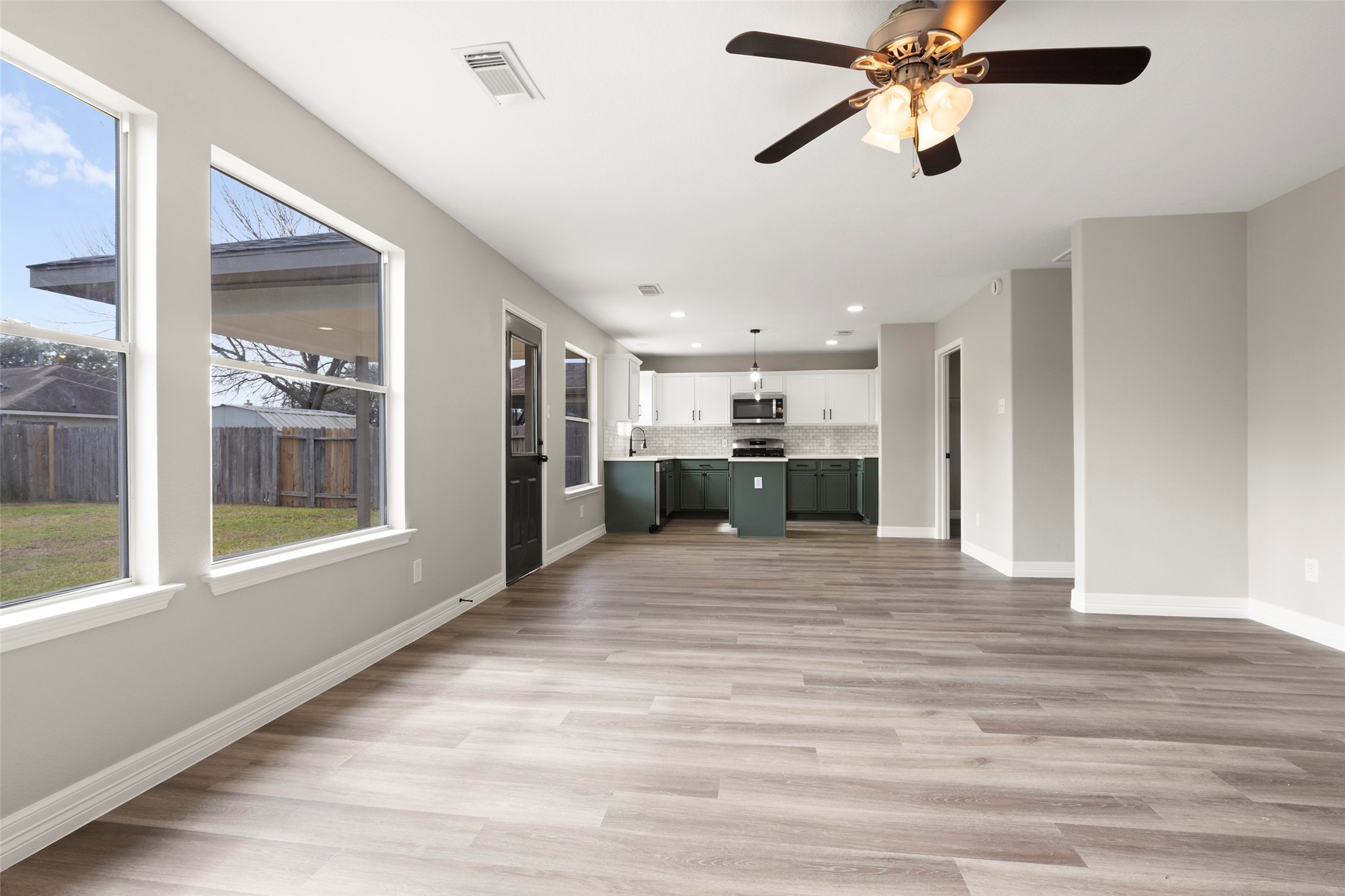 2406 Pinpoint Drive Spring, TX 77373 - Photo 9 of 25 a view of a kitchen and a windows a ceiling fan