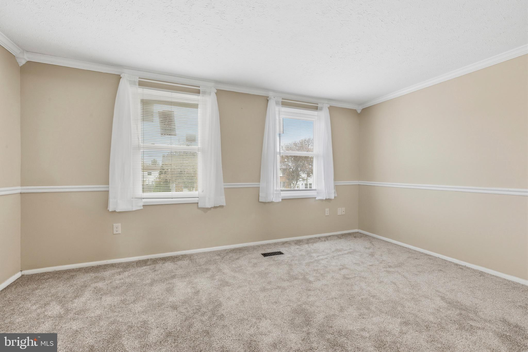 232 Canfield Terrace Frederick, MD 21702 - Photo 13 of 30 an empty room with windows