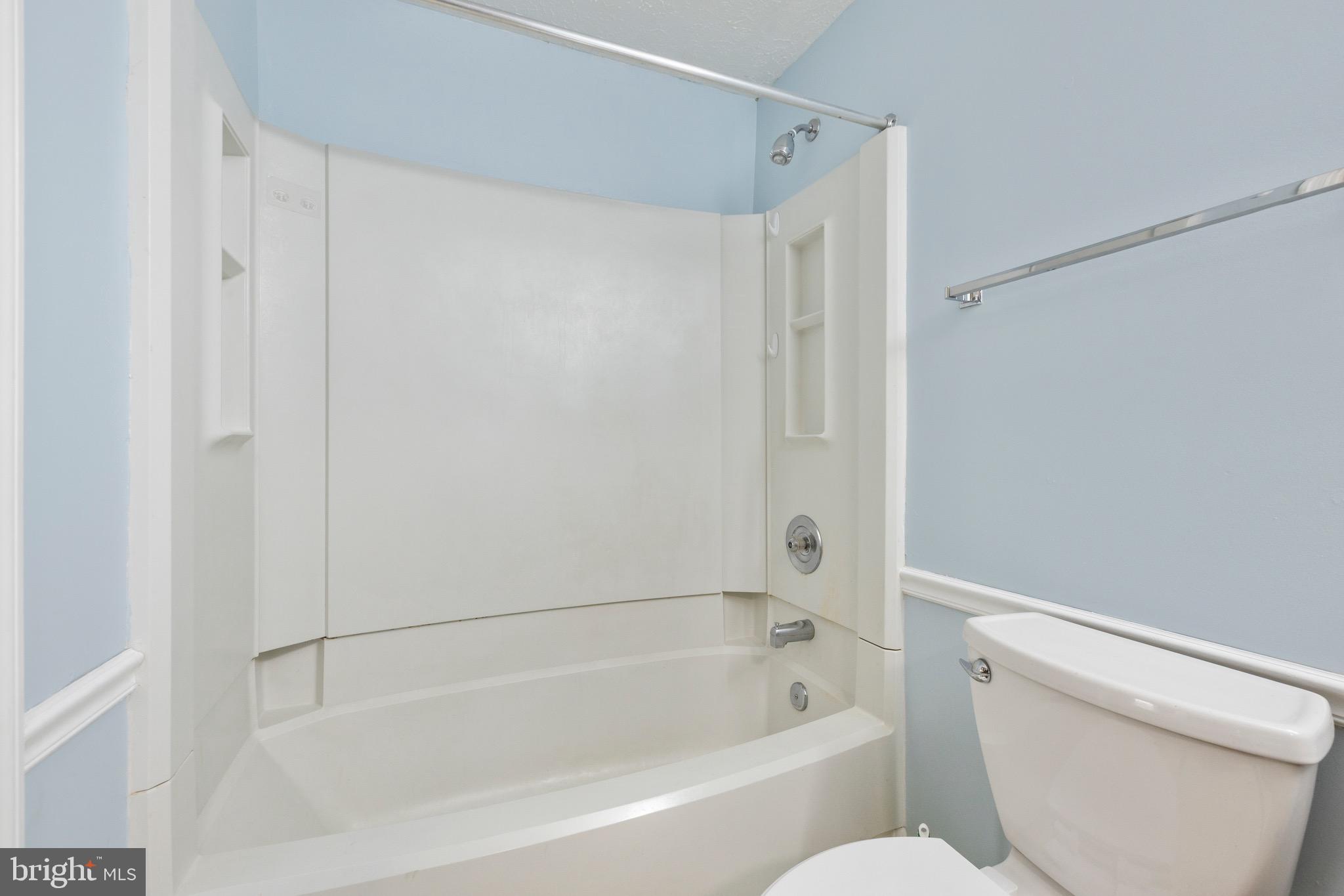 232 Canfield Terrace Frederick, MD 21702 - Photo 15 of 30 a bathroom with a bathtub and a toilet