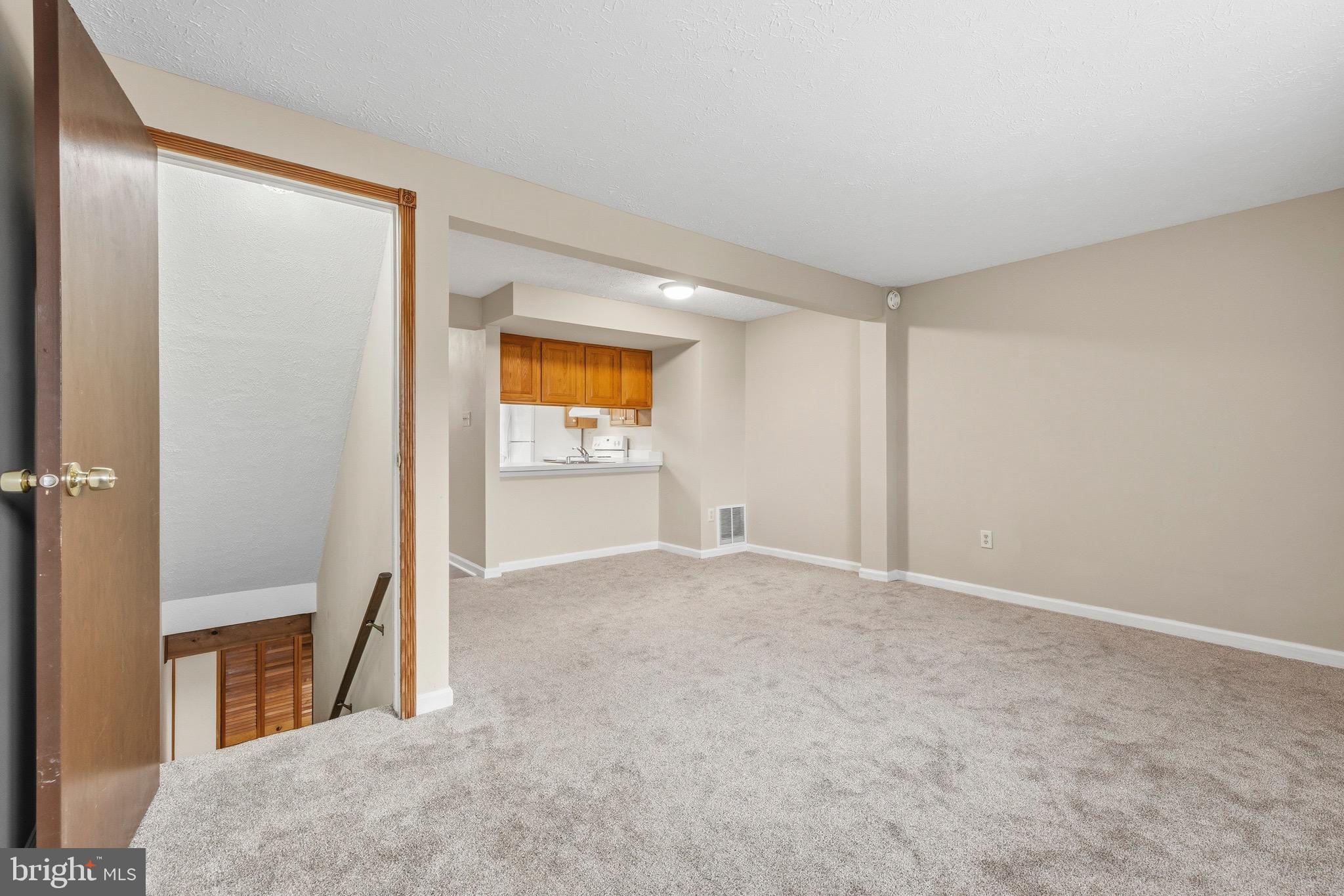 232 Canfield Terrace Frederick, MD 21702 - Photo 19 of 30 a view of an empty room and a window