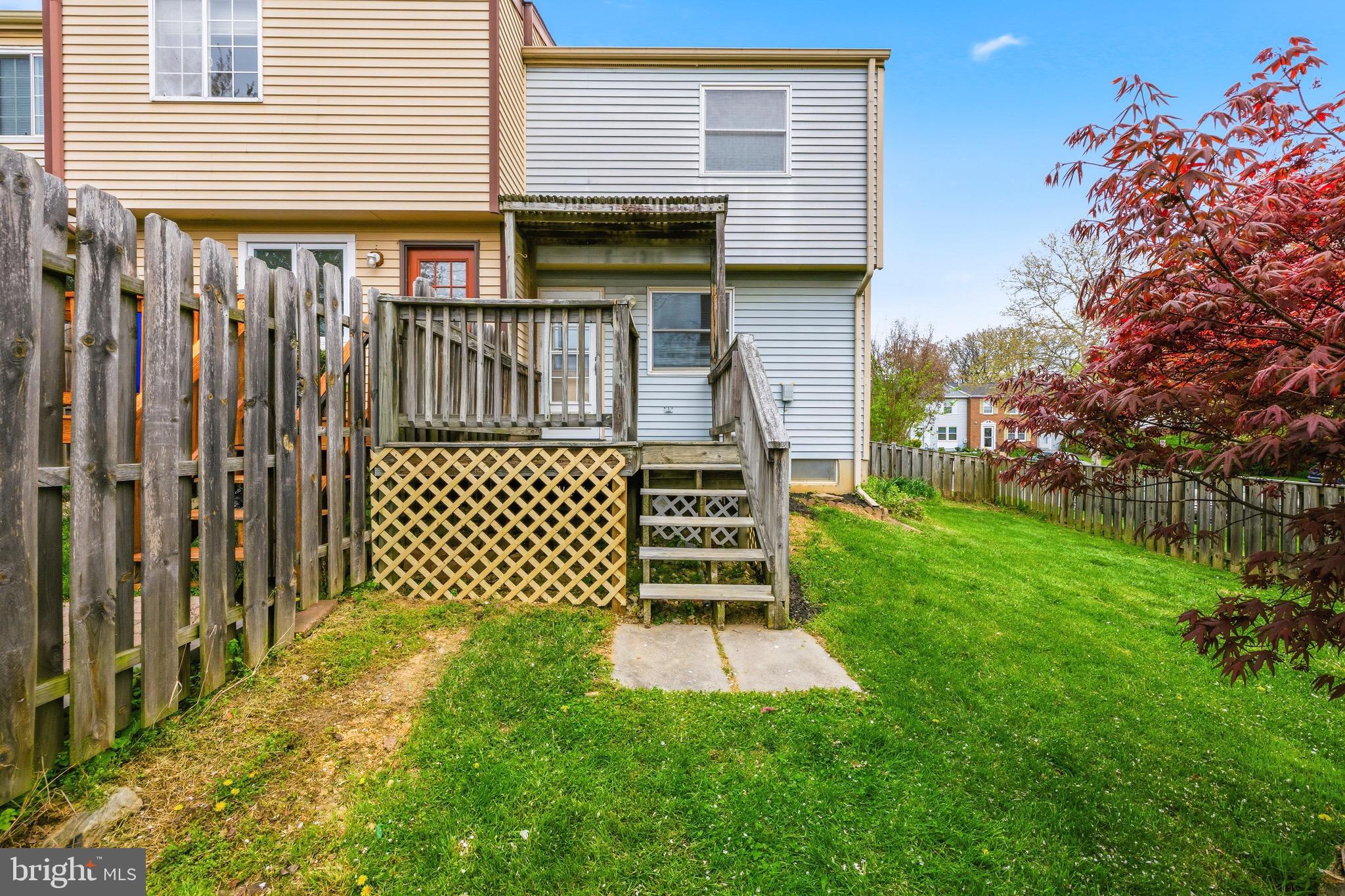 232 Canfield Terrace Frederick, MD 21702 - Photo 26 of 30 a view of a house with a wooden fence