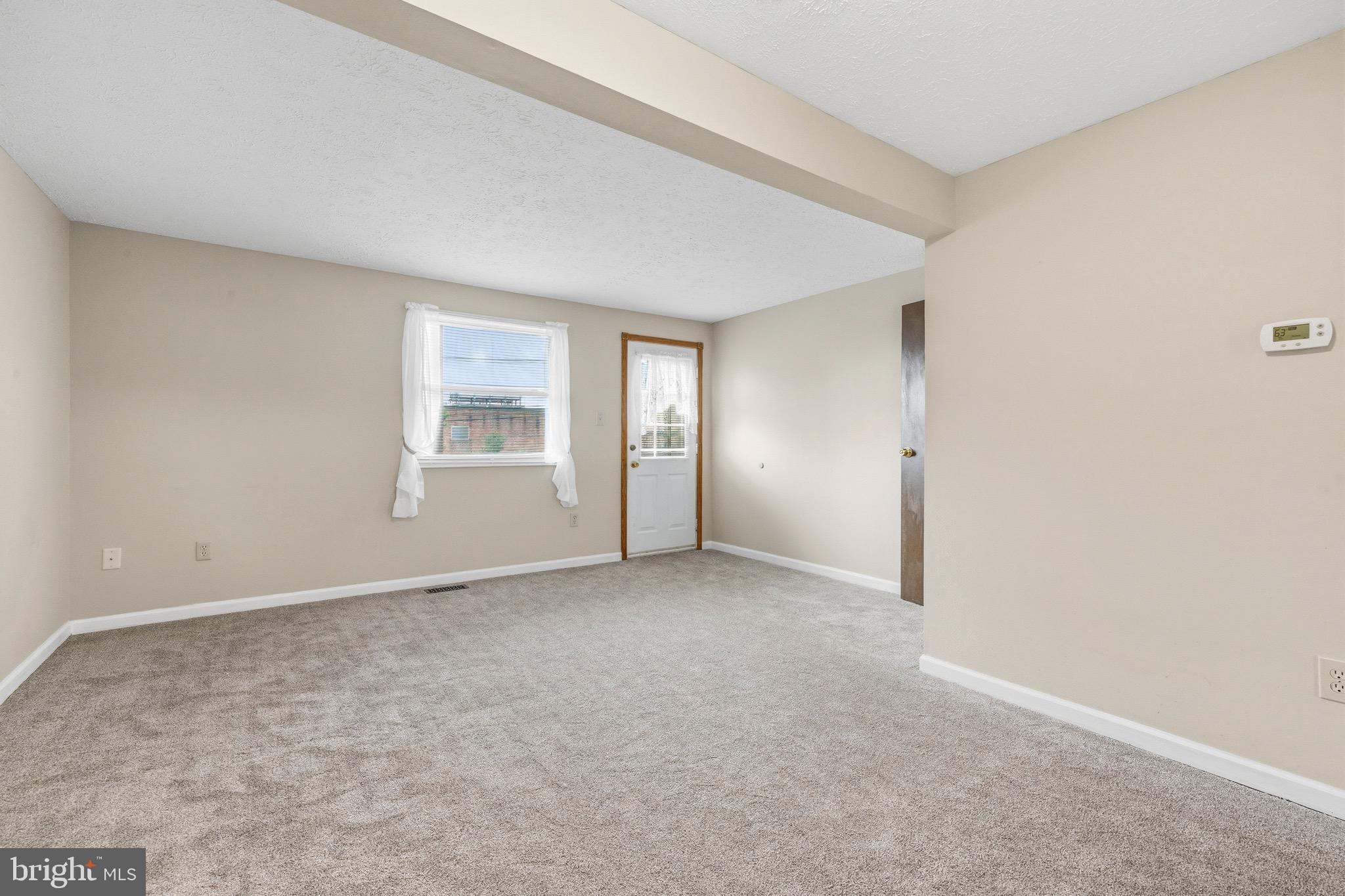232 Canfield Terrace Frederick, MD 21702 - Photo 7 of 30 an empty room with windows and closet