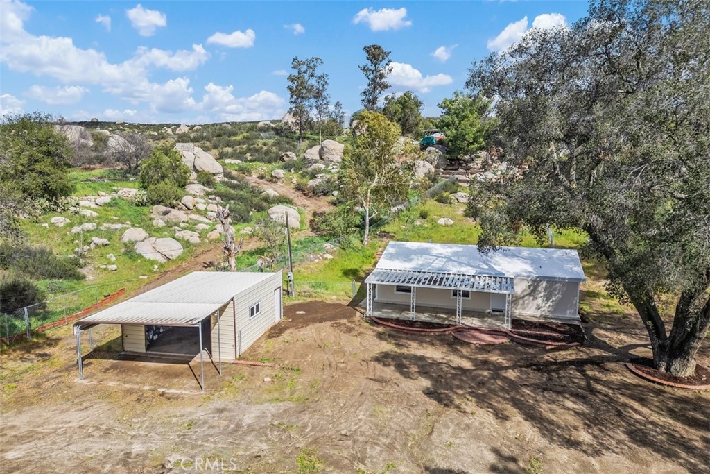 42580 East Benton Road Hemet, CA 92544 - Photo 1 of 31 an aerial view of a house with a yard