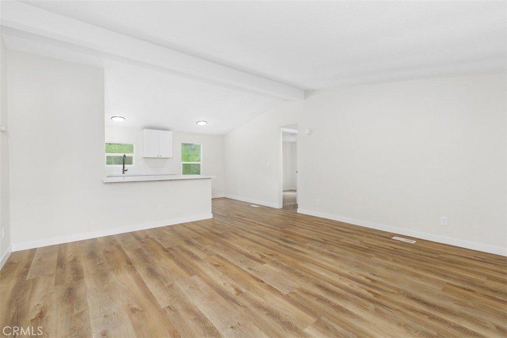 42580 East Benton Road Hemet, CA 92544 - Photo 11 of 31 a view of empty room with wooden floor