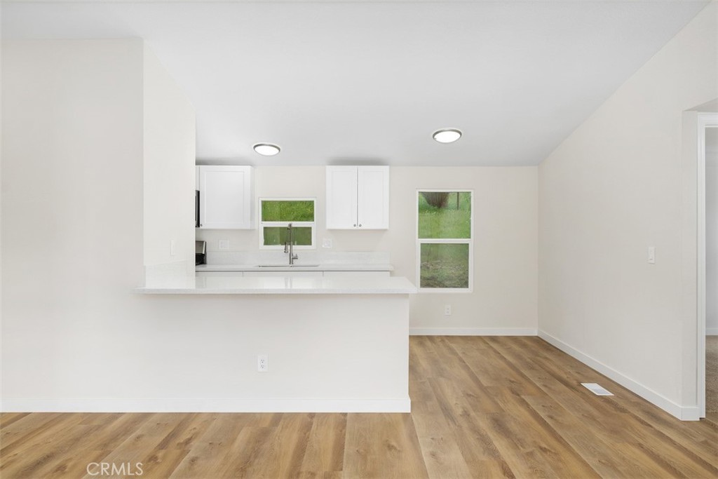 42580 East Benton Road Hemet, CA 92544 - Photo 12 of 31 a view of a kitchen with a sink and a window